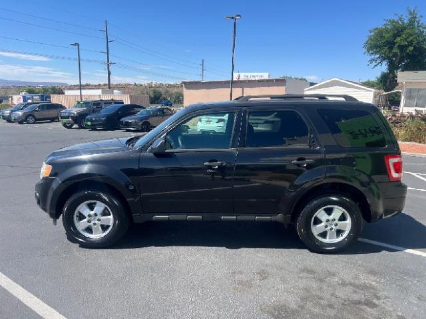 2011 Tuxedo Black Metallic /Stone Ford Escape XLT (1FMCU0D71BK) , Automatic transmission, located at 940 North Main Street, Cedar City, UT, 84720, (435) 628-0023, 37.692936, -113.061897 - We specialize in helping ALL people get the best financing available. No matter your credit score, good, bad or none we can get you an amazing rate. Had a bankruptcy, divorce, or repossessions? We give you the green light to get your credit back on the road. Low down and affordable payments that fit- Photo#3