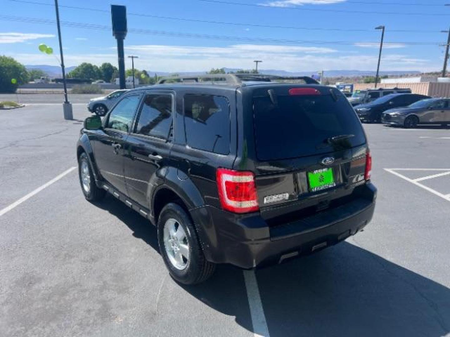 2011 Tuxedo Black Metallic /Stone Ford Escape XLT (1FMCU0D71BK) , Automatic transmission, located at 940 North Main Street, Cedar City, UT, 84720, (435) 628-0023, 37.692936, -113.061897 - We specialize in helping ALL people get the best financing available. No matter your credit score, good, bad or none we can get you an amazing rate. Had a bankruptcy, divorce, or repossessions? We give you the green light to get your credit back on the road. Low down and affordable payments that fit- Photo#4
