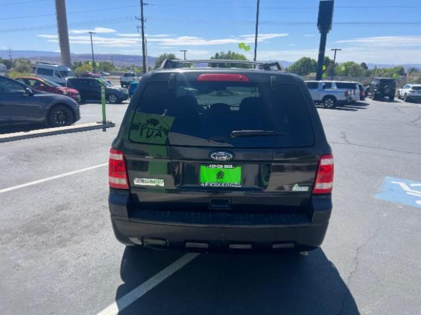 2011 Tuxedo Black Metallic /Stone Ford Escape XLT (1FMCU0D71BK) , Automatic transmission, located at 940 North Main Street, Cedar City, UT, 84720, (435) 628-0023, 37.692936, -113.061897 - We specialize in helping ALL people get the best financing available. No matter your credit score, good, bad or none we can get you an amazing rate. Had a bankruptcy, divorce, or repossessions? We give you the green light to get your credit back on the road. Low down and affordable payments that fit- Photo#5