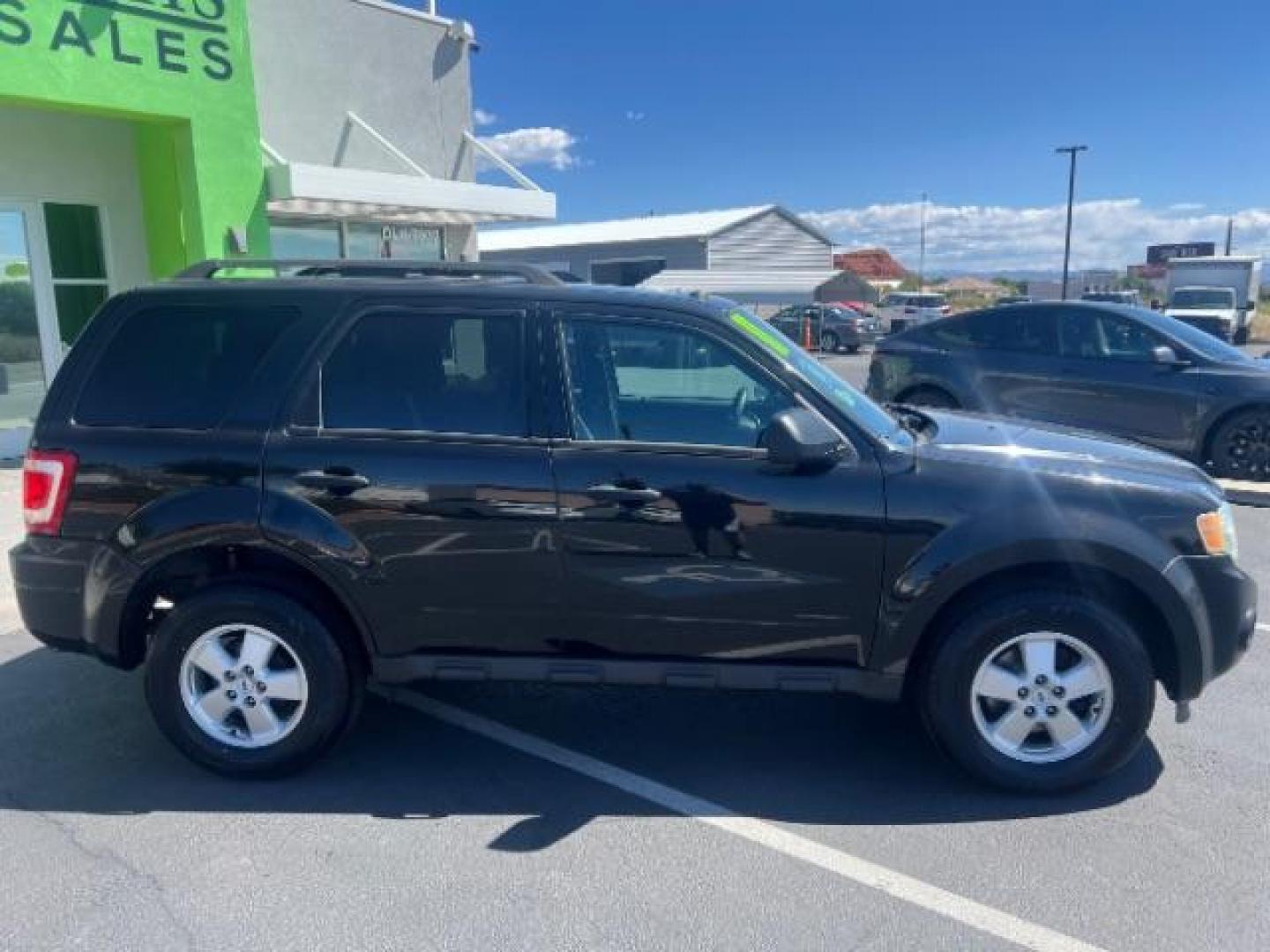 2011 Tuxedo Black Metallic /Stone Ford Escape XLT (1FMCU0D71BK) , Automatic transmission, located at 940 North Main Street, Cedar City, UT, 84720, (435) 628-0023, 37.692936, -113.061897 - We specialize in helping ALL people get the best financing available. No matter your credit score, good, bad or none we can get you an amazing rate. Had a bankruptcy, divorce, or repossessions? We give you the green light to get your credit back on the road. Low down and affordable payments that fit- Photo#7