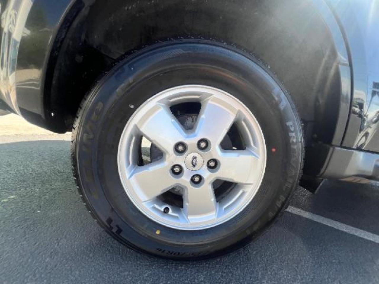 2011 Tuxedo Black Metallic /Stone Ford Escape XLT (1FMCU0D71BK) , Automatic transmission, located at 940 North Main Street, Cedar City, UT, 84720, (435) 628-0023, 37.692936, -113.061897 - We specialize in helping ALL people get the best financing available. No matter your credit score, good, bad or none we can get you an amazing rate. Had a bankruptcy, divorce, or repossessions? We give you the green light to get your credit back on the road. Low down and affordable payments that fit- Photo#8
