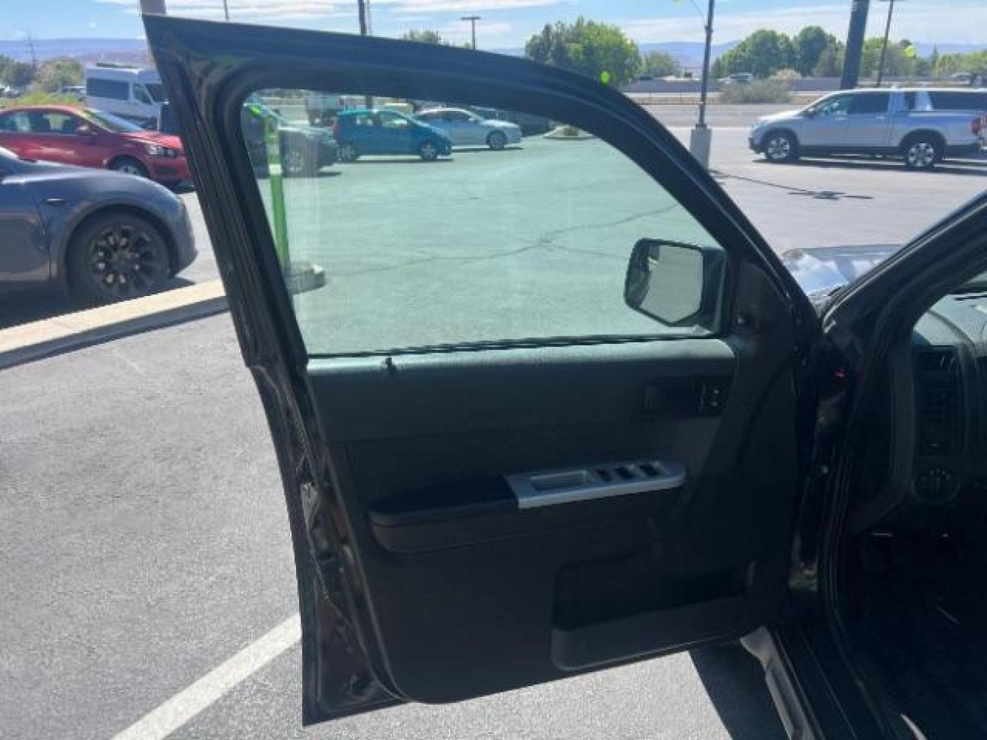 2011 Tuxedo Black Metallic /Stone Ford Escape XLT (1FMCU0D71BK) , Automatic transmission, located at 940 North Main Street, Cedar City, UT, 84720, (435) 628-0023, 37.692936, -113.061897 - We specialize in helping ALL people get the best financing available. No matter your credit score, good, bad or none we can get you an amazing rate. Had a bankruptcy, divorce, or repossessions? We give you the green light to get your credit back on the road. Low down and affordable payments that fit- Photo#12