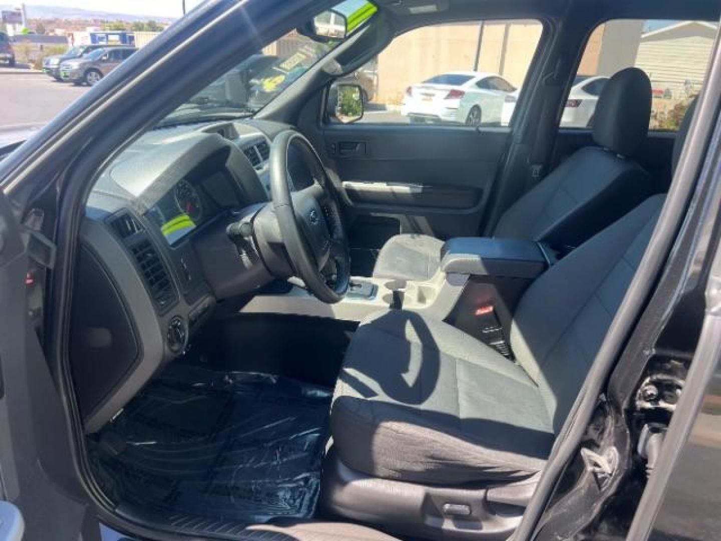 2011 Tuxedo Black Metallic /Stone Ford Escape XLT (1FMCU0D71BK) , Automatic transmission, located at 940 North Main Street, Cedar City, UT, 84720, (435) 628-0023, 37.692936, -113.061897 - We specialize in helping ALL people get the best financing available. No matter your credit score, good, bad or none we can get you an amazing rate. Had a bankruptcy, divorce, or repossessions? We give you the green light to get your credit back on the road. Low down and affordable payments that fit- Photo#14