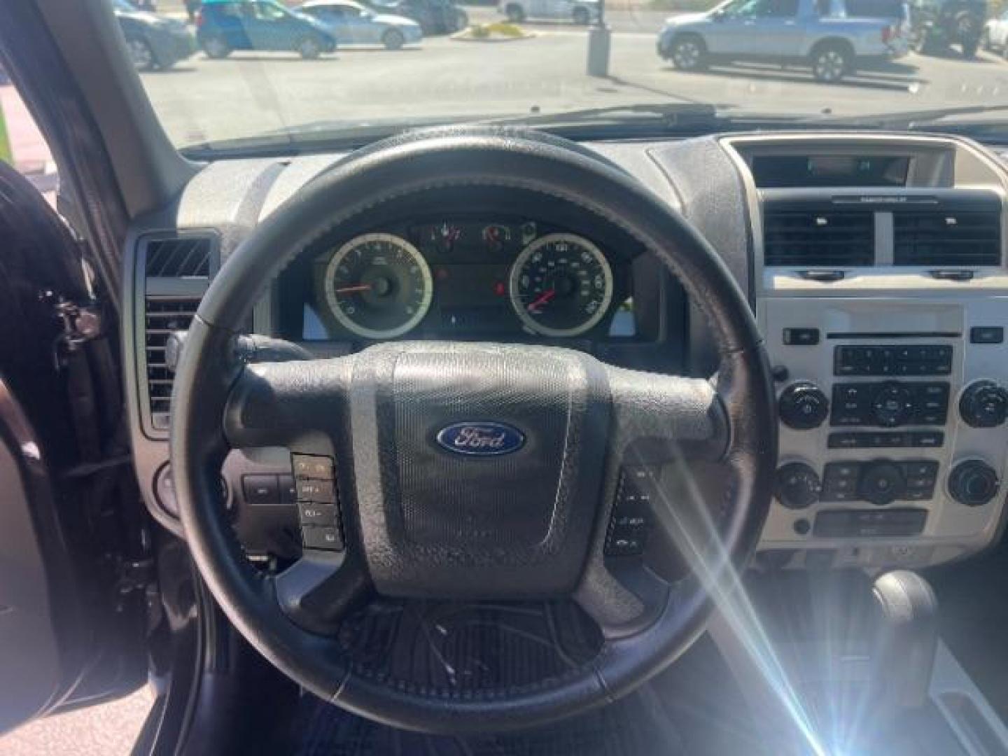 2011 Tuxedo Black Metallic /Stone Ford Escape XLT (1FMCU0D71BK) , Automatic transmission, located at 940 North Main Street, Cedar City, UT, 84720, (435) 628-0023, 37.692936, -113.061897 - We specialize in helping ALL people get the best financing available. No matter your credit score, good, bad or none we can get you an amazing rate. Had a bankruptcy, divorce, or repossessions? We give you the green light to get your credit back on the road. Low down and affordable payments that fit- Photo#15