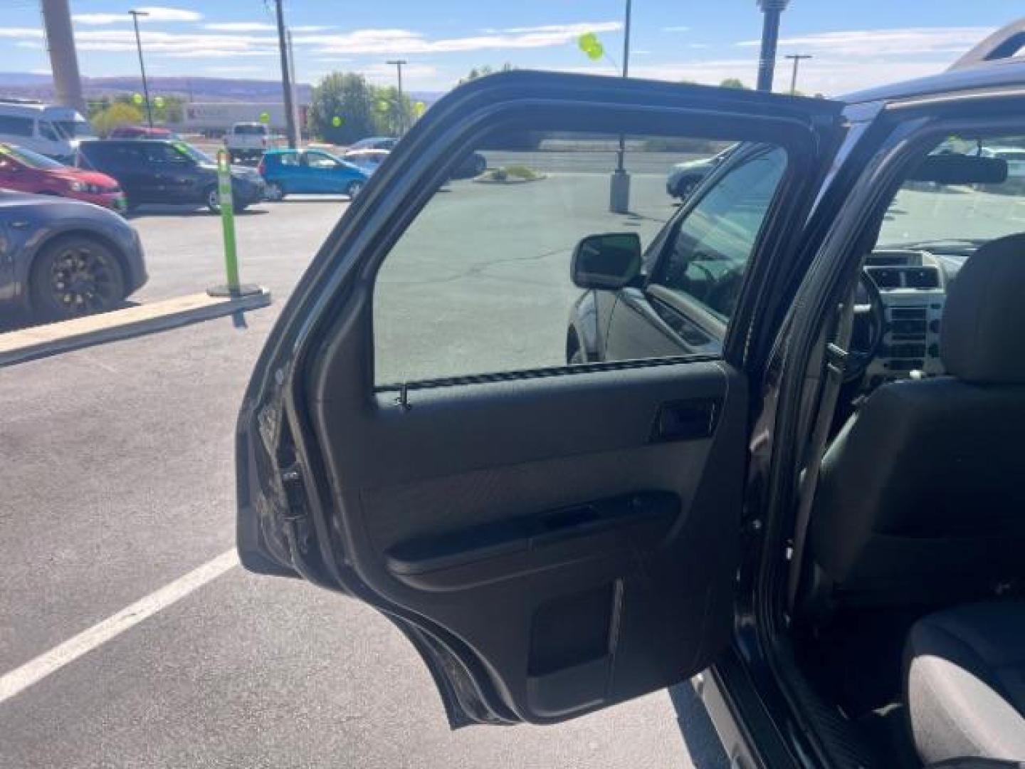 2011 Tuxedo Black Metallic /Stone Ford Escape XLT (1FMCU0D71BK) , Automatic transmission, located at 940 North Main Street, Cedar City, UT, 84720, (435) 628-0023, 37.692936, -113.061897 - We specialize in helping ALL people get the best financing available. No matter your credit score, good, bad or none we can get you an amazing rate. Had a bankruptcy, divorce, or repossessions? We give you the green light to get your credit back on the road. Low down and affordable payments that fit- Photo#20