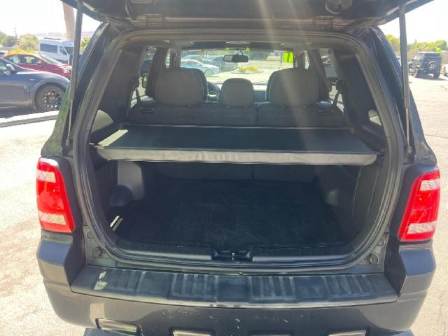 2011 Tuxedo Black Metallic /Stone Ford Escape XLT (1FMCU0D71BK) , Automatic transmission, located at 940 North Main Street, Cedar City, UT, 84720, (435) 628-0023, 37.692936, -113.061897 - We specialize in helping ALL people get the best financing available. No matter your credit score, good, bad or none we can get you an amazing rate. Had a bankruptcy, divorce, or repossessions? We give you the green light to get your credit back on the road. Low down and affordable payments that fit- Photo#23