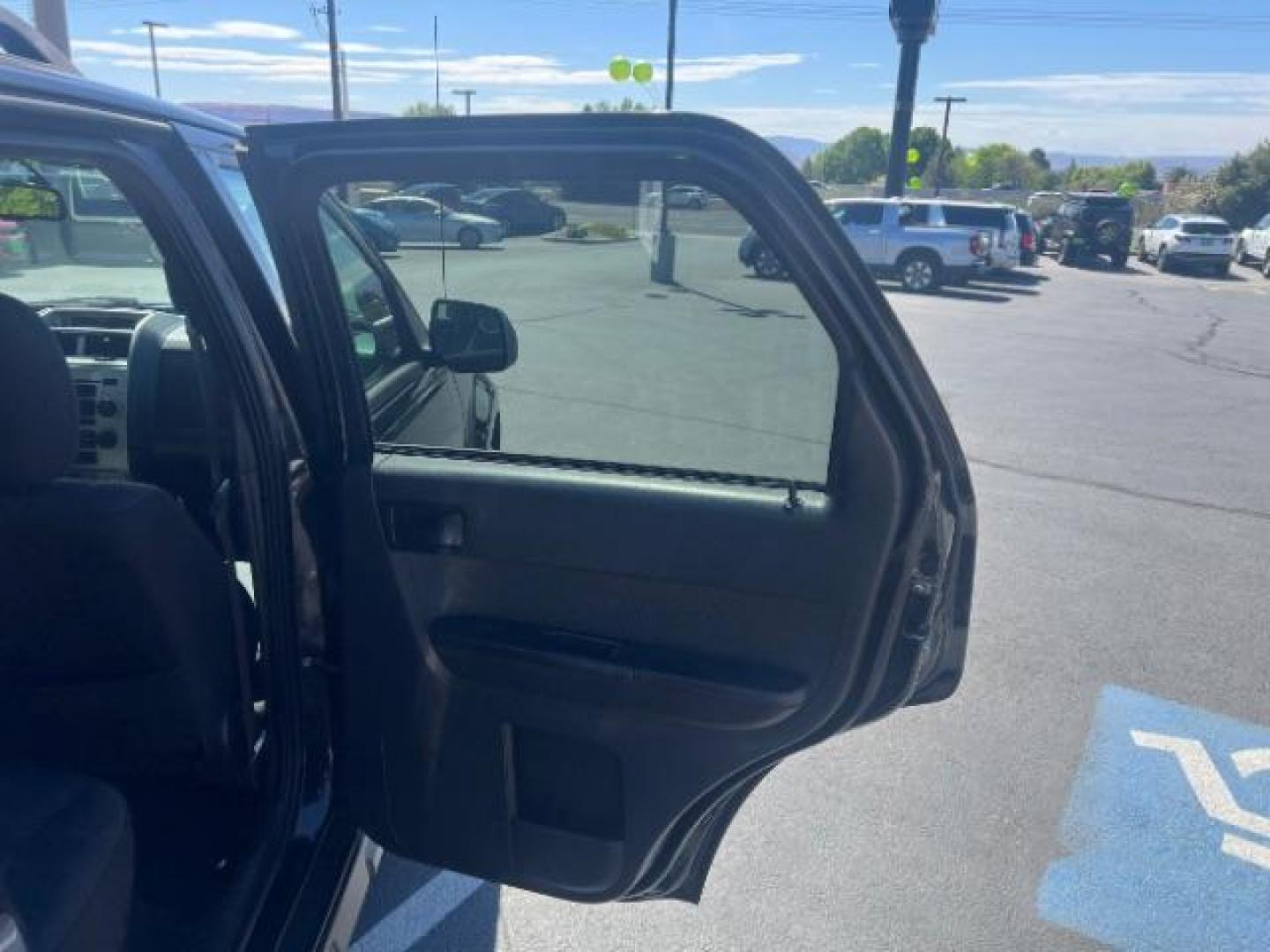 2011 Tuxedo Black Metallic /Stone Ford Escape XLT (1FMCU0D71BK) , Automatic transmission, located at 940 North Main Street, Cedar City, UT, 84720, (435) 628-0023, 37.692936, -113.061897 - We specialize in helping ALL people get the best financing available. No matter your credit score, good, bad or none we can get you an amazing rate. Had a bankruptcy, divorce, or repossessions? We give you the green light to get your credit back on the road. Low down and affordable payments that fit- Photo#24
