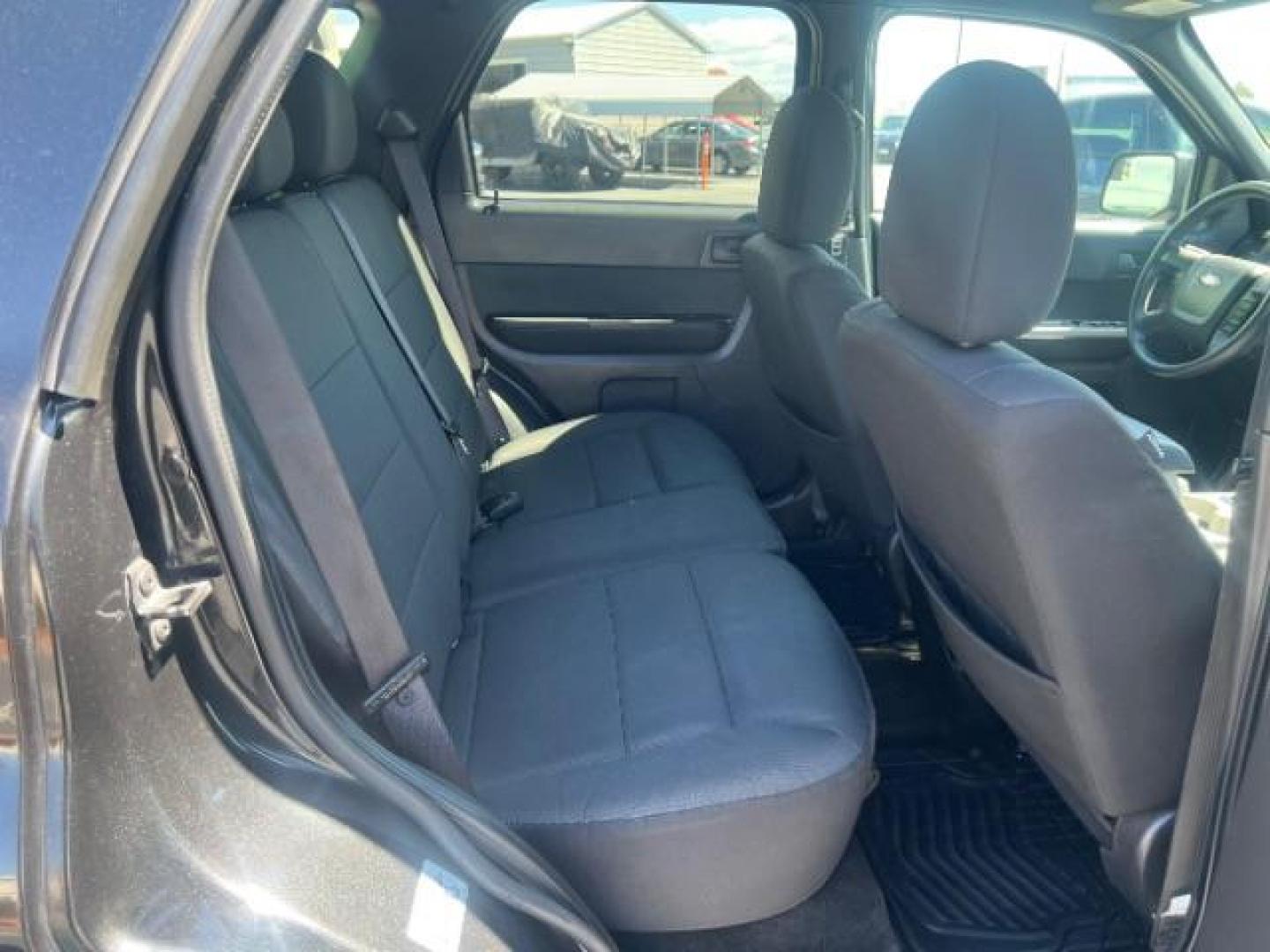 2011 Tuxedo Black Metallic /Stone Ford Escape XLT (1FMCU0D71BK) , Automatic transmission, located at 940 North Main Street, Cedar City, UT, 84720, (435) 628-0023, 37.692936, -113.061897 - We specialize in helping ALL people get the best financing available. No matter your credit score, good, bad or none we can get you an amazing rate. Had a bankruptcy, divorce, or repossessions? We give you the green light to get your credit back on the road. Low down and affordable payments that fit- Photo#25