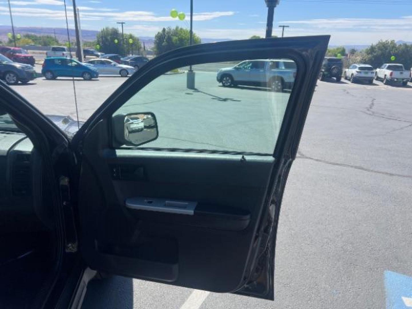 2011 Tuxedo Black Metallic /Stone Ford Escape XLT (1FMCU0D71BK) , Automatic transmission, located at 940 North Main Street, Cedar City, UT, 84720, (435) 628-0023, 37.692936, -113.061897 - We specialize in helping ALL people get the best financing available. No matter your credit score, good, bad or none we can get you an amazing rate. Had a bankruptcy, divorce, or repossessions? We give you the green light to get your credit back on the road. Low down and affordable payments that fit- Photo#26