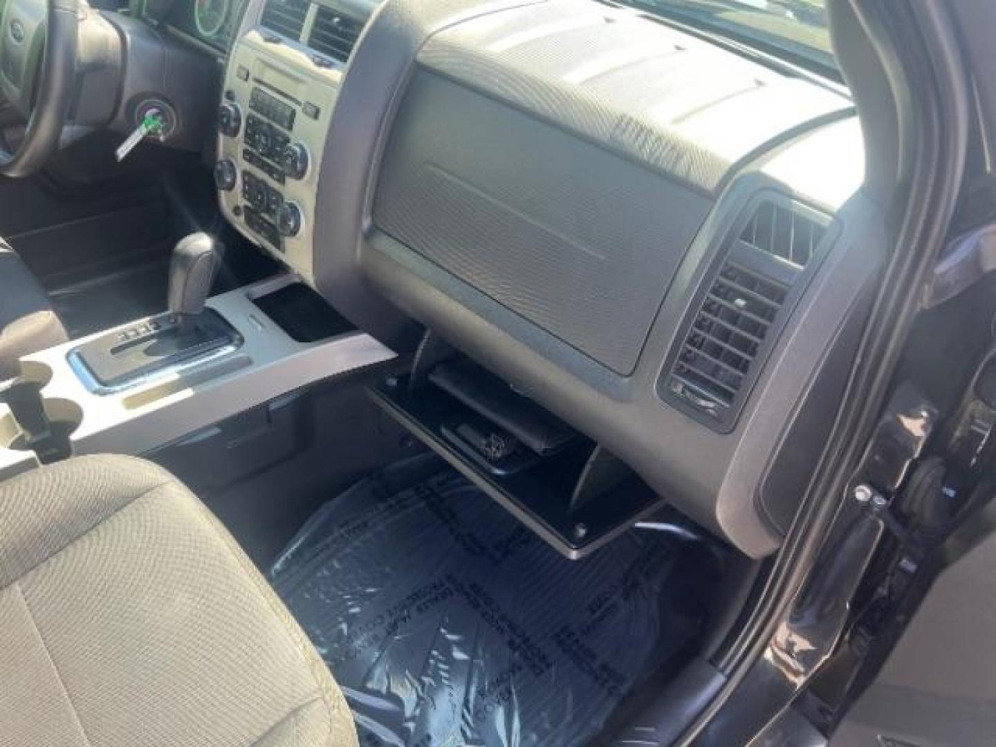 2011 Tuxedo Black Metallic /Stone Ford Escape XLT (1FMCU0D71BK) , Automatic transmission, located at 940 North Main Street, Cedar City, UT, 84720, (435) 628-0023, 37.692936, -113.061897 - We specialize in helping ALL people get the best financing available. No matter your credit score, good, bad or none we can get you an amazing rate. Had a bankruptcy, divorce, or repossessions? We give you the green light to get your credit back on the road. Low down and affordable payments that fit- Photo#28