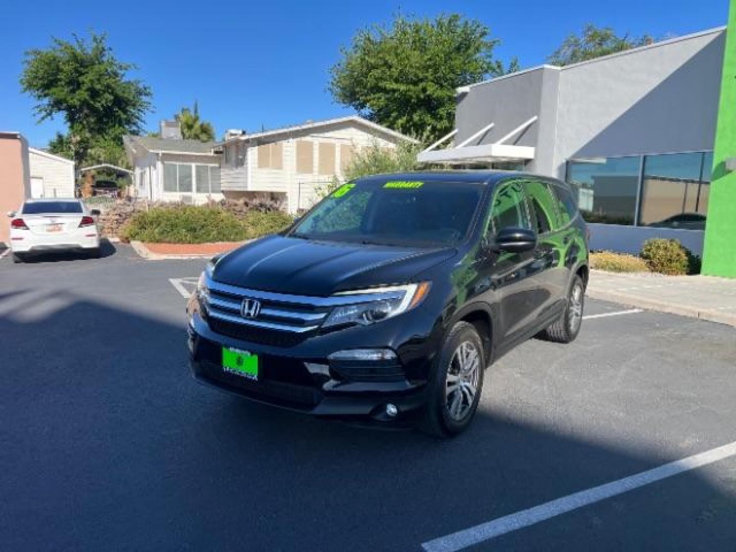 2016 Crystal Black Pearl /Beige Honda Pilot EX-L (5FNYF5H51GB) with an 3.5L V-6 gasoline direct injection engine, Automatic transmission, located at 1865 East Red Hills Pkwy, St. George, 84770, (435) 628-0023, 37.120850, -113.543640 - We specialize in helping ALL people get the best financing available. No matter your credit score, good, bad or none we can get you an amazing rate. Had a bankruptcy, divorce, or repossessions? We give you the green light to get your credit back on the road. Low down and affordable payments that fit - Photo#2