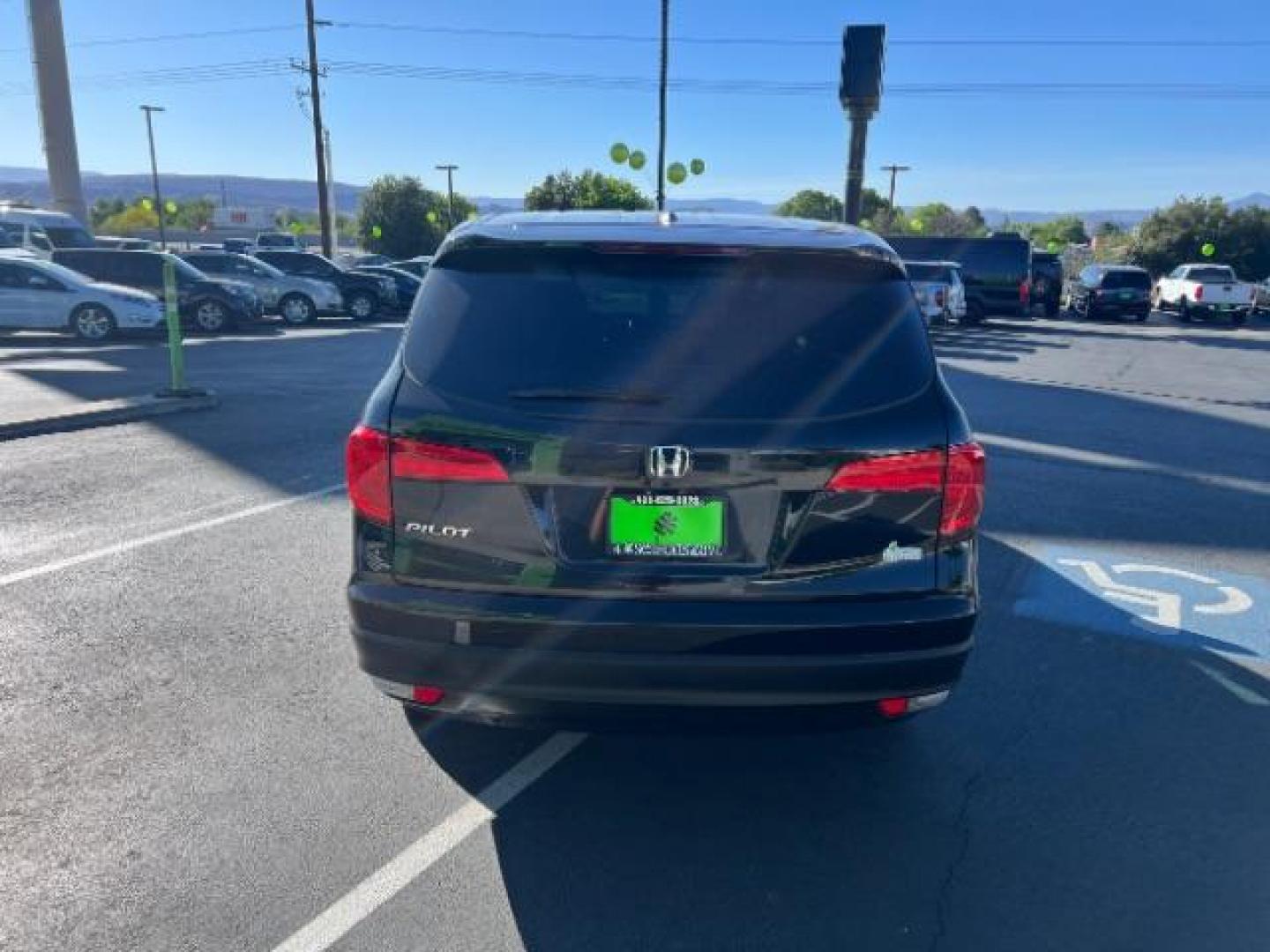 2016 Crystal Black Pearl /Beige Honda Pilot EX-L (5FNYF5H51GB) with an 3.5L V-6 gasoline direct injection engine, Automatic transmission, located at 1865 East Red Hills Pkwy, St. George, 84770, (435) 628-0023, 37.120850, -113.543640 - We specialize in helping ALL people get the best financing available. No matter your credit score, good, bad or none we can get you an amazing rate. Had a bankruptcy, divorce, or repossessions? We give you the green light to get your credit back on the road. Low down and affordable payments that fit - Photo#5
