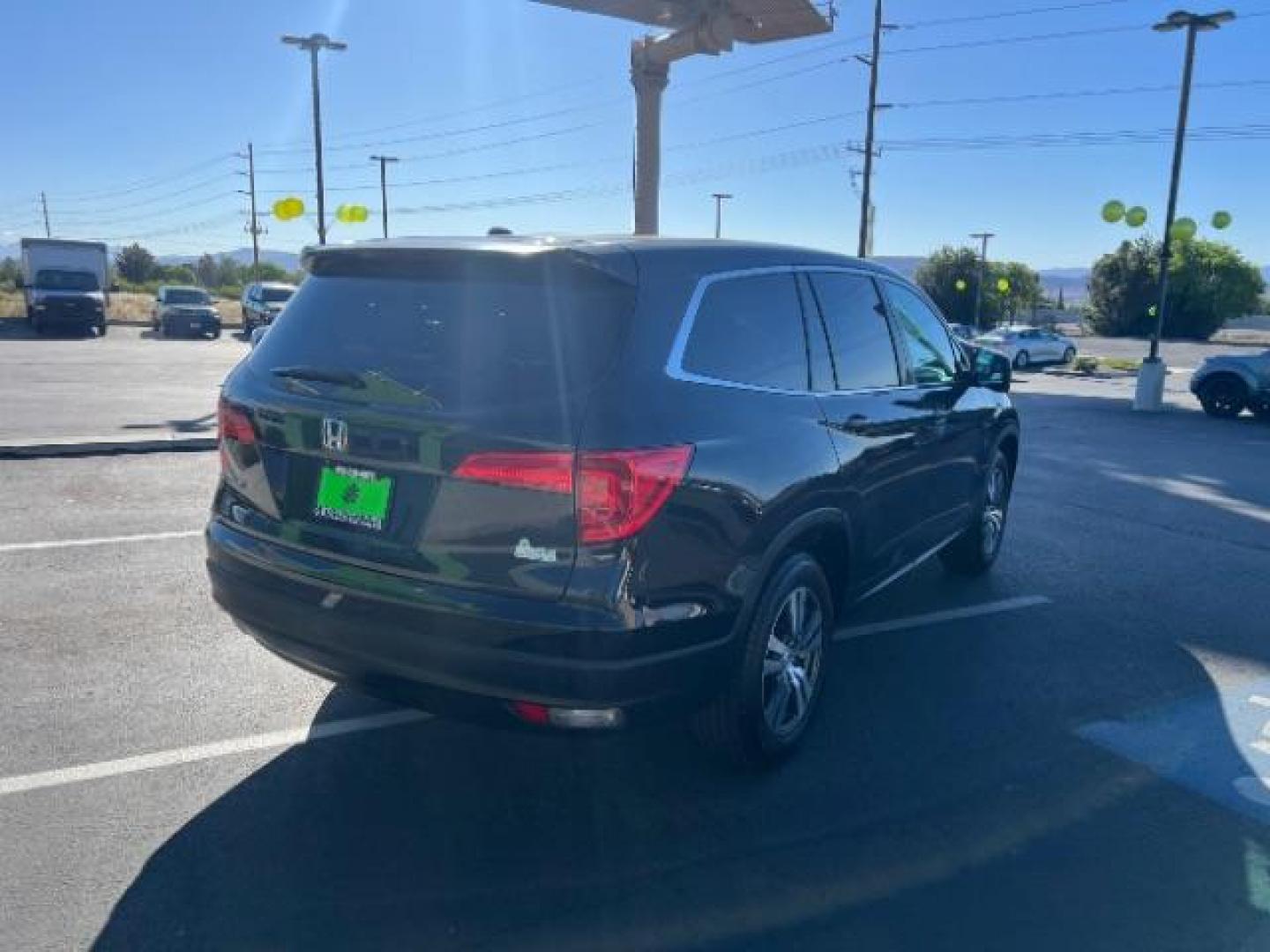 2016 Crystal Black Pearl /Beige Honda Pilot EX-L (5FNYF5H51GB) with an 3.5L V-6 gasoline direct injection engine, Automatic transmission, located at 1865 East Red Hills Pkwy, St. George, 84770, (435) 628-0023, 37.120850, -113.543640 - We specialize in helping ALL people get the best financing available. No matter your credit score, good, bad or none we can get you an amazing rate. Had a bankruptcy, divorce, or repossessions? We give you the green light to get your credit back on the road. Low down and affordable payments that fit - Photo#6