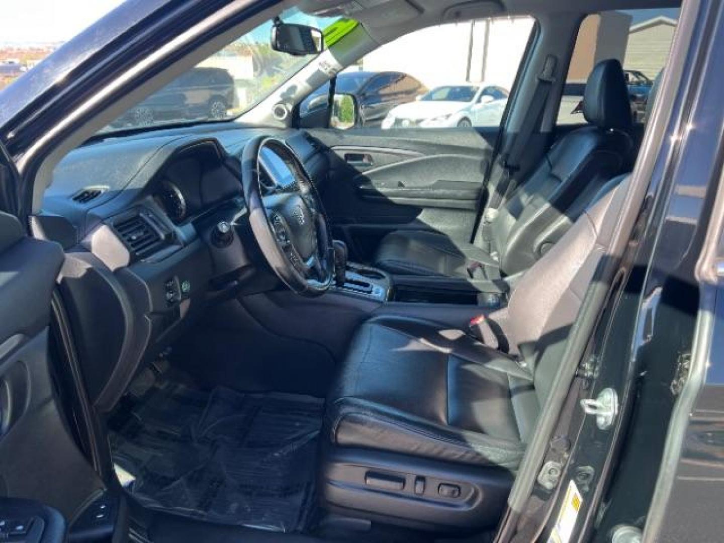 2016 Crystal Black Pearl /Beige Honda Pilot EX-L (5FNYF5H51GB) with an 3.5L V-6 gasoline direct injection engine, Automatic transmission, located at 1865 East Red Hills Pkwy, St. George, 84770, (435) 628-0023, 37.120850, -113.543640 - We specialize in helping ALL people get the best financing available. No matter your credit score, good, bad or none we can get you an amazing rate. Had a bankruptcy, divorce, or repossessions? We give you the green light to get your credit back on the road. Low down and affordable payments that fit - Photo#14