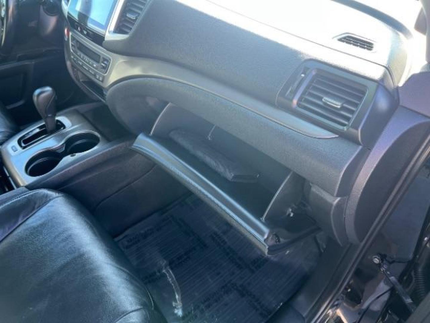 2016 Crystal Black Pearl /Beige Honda Pilot EX-L (5FNYF5H51GB) with an 3.5L V-6 gasoline direct injection engine, Automatic transmission, located at 1865 East Red Hills Pkwy, St. George, 84770, (435) 628-0023, 37.120850, -113.543640 - We specialize in helping ALL people get the best financing available. No matter your credit score, good, bad or none we can get you an amazing rate. Had a bankruptcy, divorce, or repossessions? We give you the green light to get your credit back on the road. Low down and affordable payments that fit - Photo#29