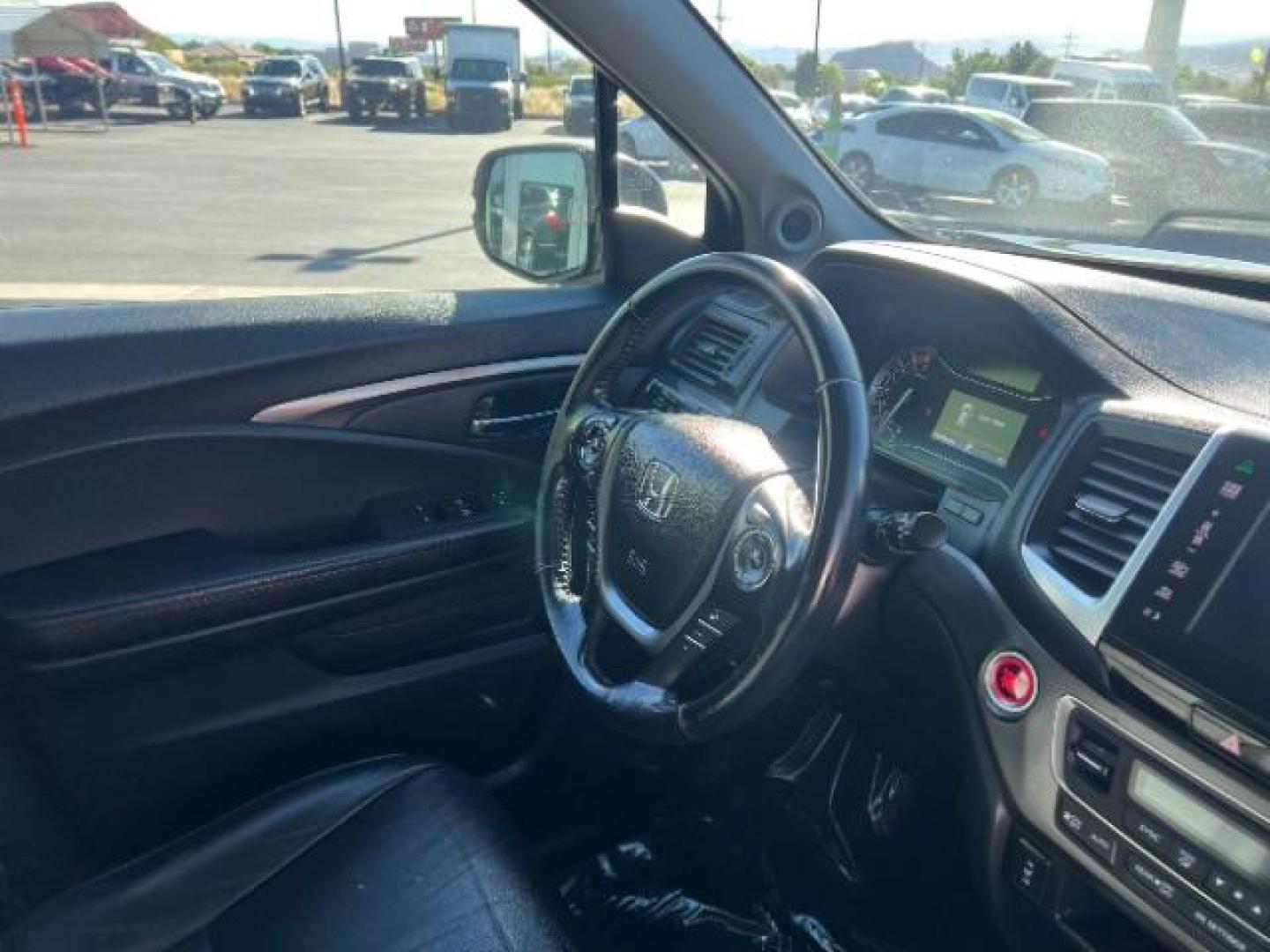2016 Crystal Black Pearl /Beige Honda Pilot EX-L (5FNYF5H51GB) with an 3.5L V-6 gasoline direct injection engine, Automatic transmission, located at 1865 East Red Hills Pkwy, St. George, 84770, (435) 628-0023, 37.120850, -113.543640 - We specialize in helping ALL people get the best financing available. No matter your credit score, good, bad or none we can get you an amazing rate. Had a bankruptcy, divorce, or repossessions? We give you the green light to get your credit back on the road. Low down and affordable payments that fit - Photo#30