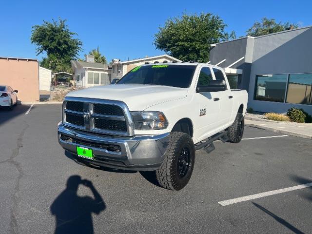 2018 Bright White Clearcoat /Diesel Gray/Black Ram 2500 Tradesman Crew Cab 4x4 6'4 Box (3C6UR5CJ5JG) with an HEMI 5.7L V-8 variable valve control engine, Automatic transmission, located at 940 North Main Street, Cedar City, UT, 84720, (435) 628-0023, 37.692936, -113.061897 - We specialize in helping ALL people get the best financing available. No matter your credit score, good, bad or none we can get you an amazing rate. Had a bankruptcy, divorce, or repossessions? We give you the green light to get your credit back on the road. Low down and affordable payments that fit - Photo#2