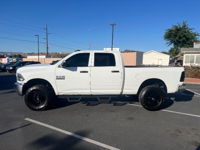 2018 Bright White Clearcoat /Diesel Gray/Black Ram 2500 Tradesman Crew Cab 4x4 6'4 Box (3C6UR5CJ5JG) with an HEMI 5.7L V-8 variable valve control engine, Automatic transmission, located at 940 North Main Street, Cedar City, UT, 84720, (435) 628-0023, 37.692936, -113.061897 - We specialize in helping ALL people get the best financing available. No matter your credit score, good, bad or none we can get you an amazing rate. Had a bankruptcy, divorce, or repossessions? We give you the green light to get your credit back on the road. Low down and affordable payments that fit - Photo#3