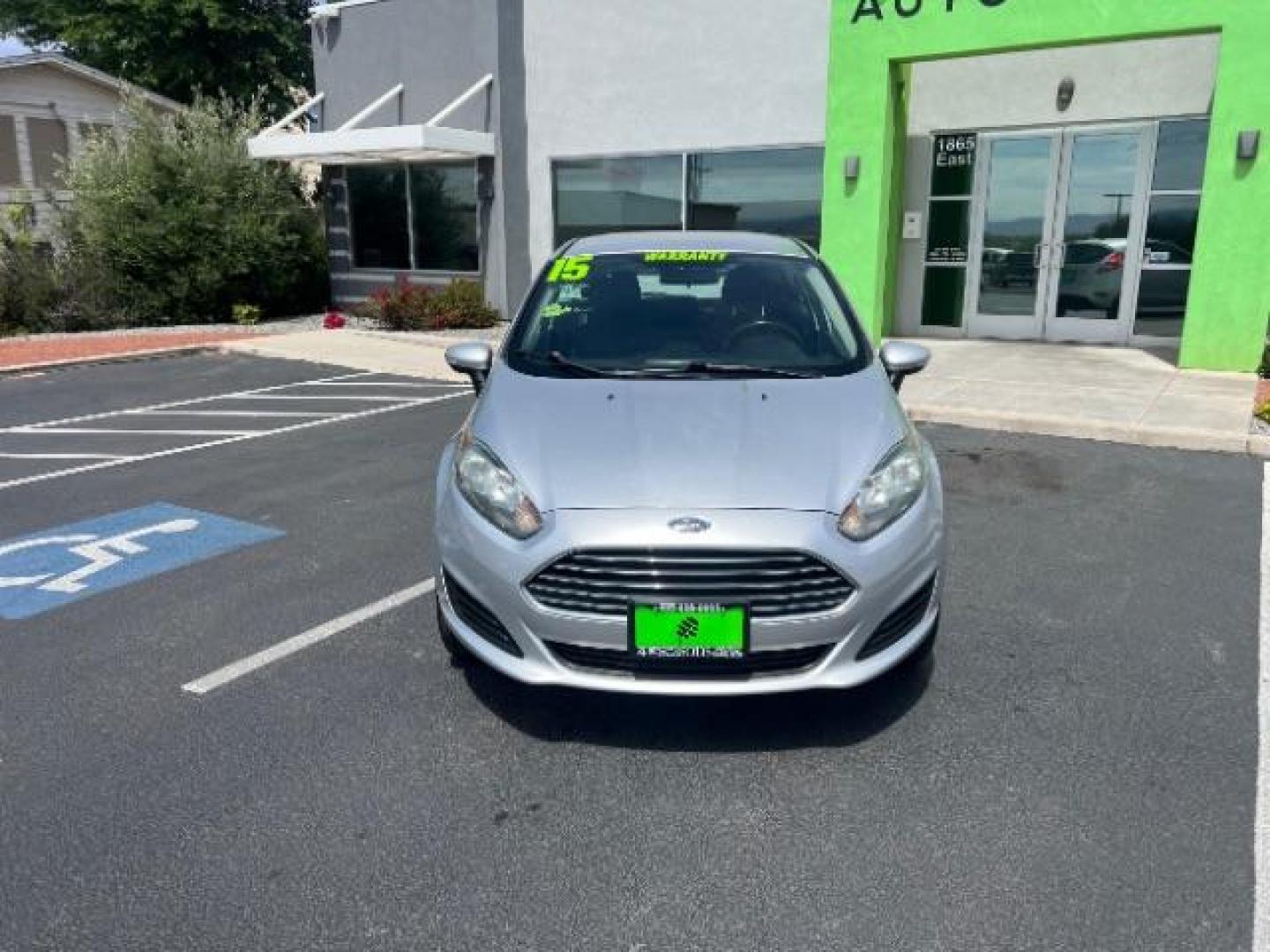2015 Ingot Silver /Medium Light Stone Ford Fiesta SE (3FADP4EJ4FM) with an EcoBoost 1L I-3 gasoline direct injection engine, Automatic transmission, located at 940 North Main Street, Cedar City, UT, 84720, (435) 628-0023, 37.692936, -113.061897 - Versatile Southern Utah travel starts with this 2015 Ford Fiesta SE hatchback. Its 1.6L 4-cylinder engine, 6-speed automatic transmission, and front-wheel drive make it a smart fit for commuting, errands, and easy city parking. With 102817 miles, this Fiesta is ready for its next adventure. The SE- Photo#1