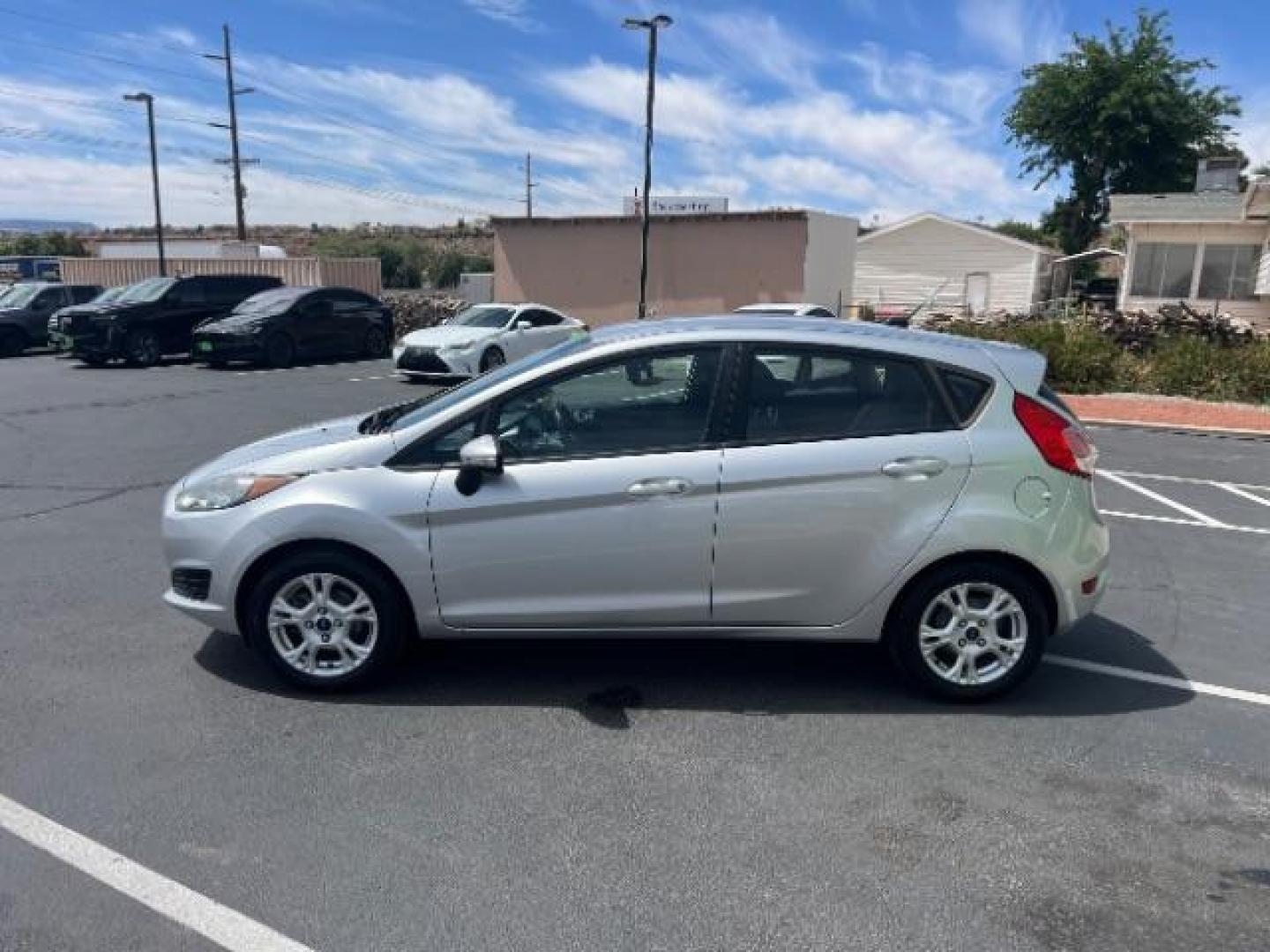 2015 Ingot Silver /Medium Light Stone Ford Fiesta SE (3FADP4EJ4FM) with an EcoBoost 1L I-3 gasoline direct injection engine, Automatic transmission, located at 940 North Main Street, Cedar City, UT, 84720, (435) 628-0023, 37.692936, -113.061897 - Versatile Southern Utah travel starts with this 2015 Ford Fiesta SE hatchback. Its 1.6L 4-cylinder engine, 6-speed automatic transmission, and front-wheel drive make it a smart fit for commuting, errands, and easy city parking. With 102817 miles, this Fiesta is ready for its next adventure. The SE- Photo#3