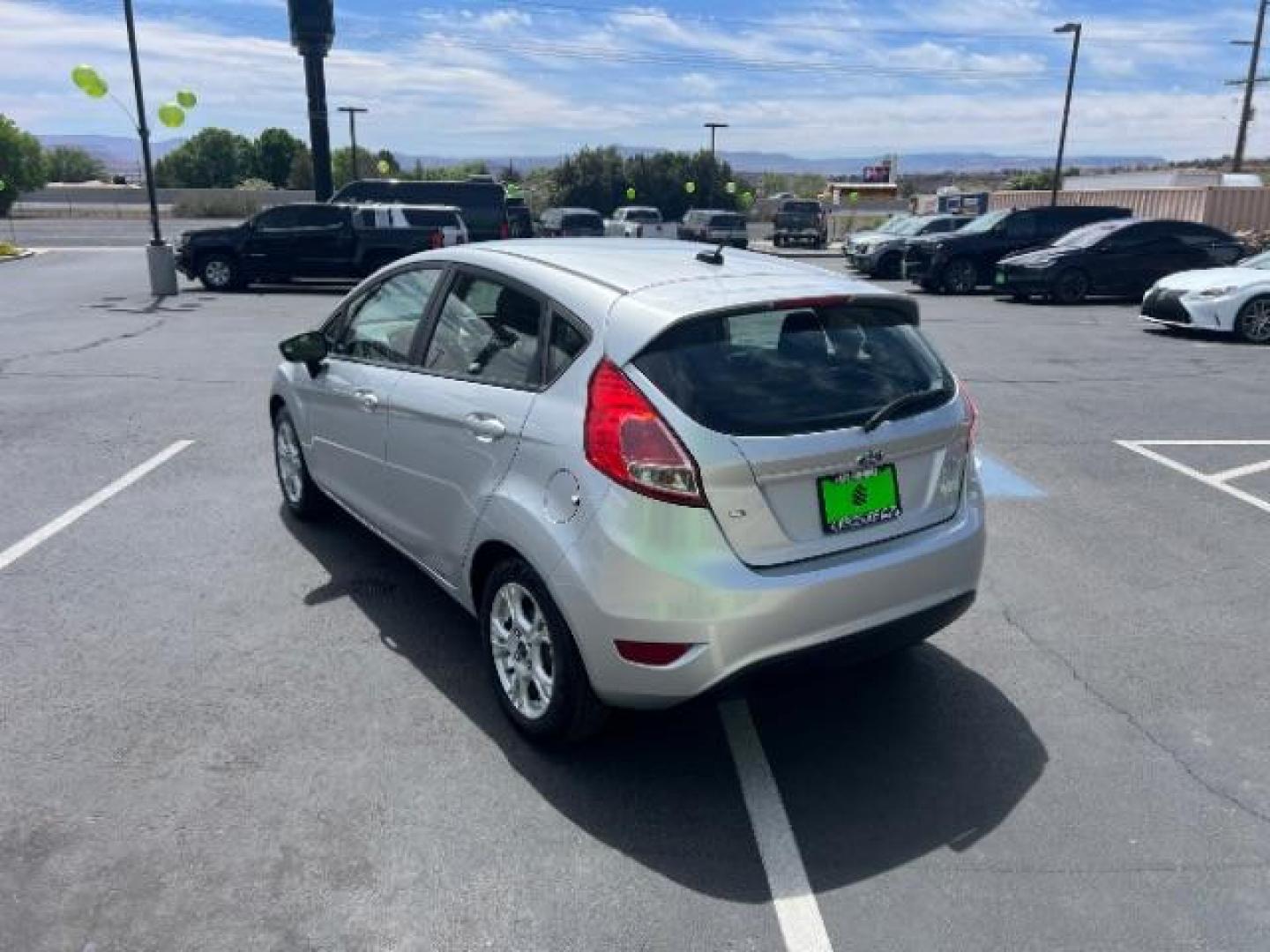 2015 Ingot Silver /Medium Light Stone Ford Fiesta SE (3FADP4EJ4FM) with an EcoBoost 1L I-3 gasoline direct injection engine, Automatic transmission, located at 940 North Main Street, Cedar City, UT, 84720, (435) 628-0023, 37.692936, -113.061897 - Versatile Southern Utah travel starts with this 2015 Ford Fiesta SE hatchback. Its 1.6L 4-cylinder engine, 6-speed automatic transmission, and front-wheel drive make it a smart fit for commuting, errands, and easy city parking. With 102817 miles, this Fiesta is ready for its next adventure. The SE- Photo#4