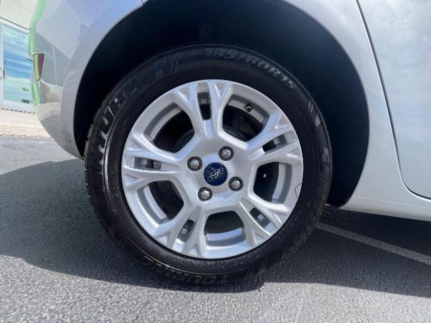 2015 Ingot Silver /Medium Light Stone Ford Fiesta SE (3FADP4EJ4FM) with an EcoBoost 1L I-3 gasoline direct injection engine, Automatic transmission, located at 940 North Main Street, Cedar City, UT, 84720, (435) 628-0023, 37.692936, -113.061897 - Versatile Southern Utah travel starts with this 2015 Ford Fiesta SE hatchback. Its 1.6L 4-cylinder engine, 6-speed automatic transmission, and front-wheel drive make it a smart fit for commuting, errands, and easy city parking. With 102817 miles, this Fiesta is ready for its next adventure. The SE- Photo#11
