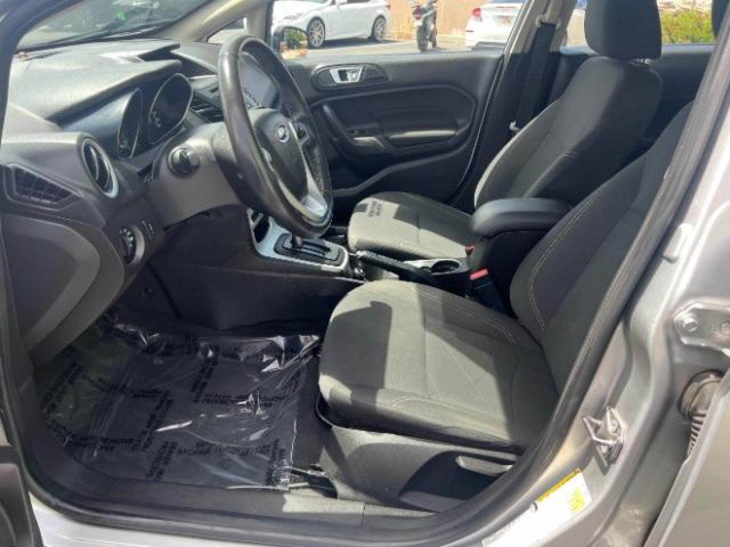 2015 Ingot Silver /Medium Light Stone Ford Fiesta SE (3FADP4EJ4FM) with an EcoBoost 1L I-3 gasoline direct injection engine, Automatic transmission, located at 940 North Main Street, Cedar City, UT, 84720, (435) 628-0023, 37.692936, -113.061897 - Versatile Southern Utah travel starts with this 2015 Ford Fiesta SE hatchback. Its 1.6L 4-cylinder engine, 6-speed automatic transmission, and front-wheel drive make it a smart fit for commuting, errands, and easy city parking. With 102817 miles, this Fiesta is ready for its next adventure. The SE- Photo#14