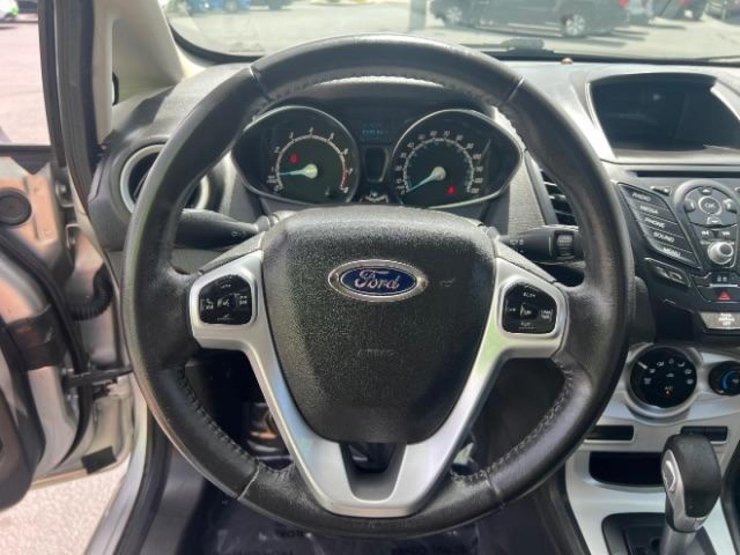 2015 Ingot Silver /Medium Light Stone Ford Fiesta SE (3FADP4EJ4FM) with an EcoBoost 1L I-3 gasoline direct injection engine, Automatic transmission, located at 940 North Main Street, Cedar City, UT, 84720, (435) 628-0023, 37.692936, -113.061897 - Versatile Southern Utah travel starts with this 2015 Ford Fiesta SE hatchback. Its 1.6L 4-cylinder engine, 6-speed automatic transmission, and front-wheel drive make it a smart fit for commuting, errands, and easy city parking. With 102817 miles, this Fiesta is ready for its next adventure. The SE- Photo#15