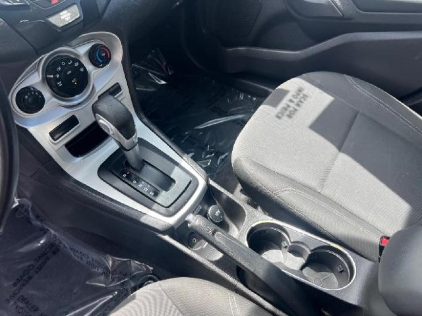 2015 Ingot Silver /Medium Light Stone Ford Fiesta SE (3FADP4EJ4FM) with an EcoBoost 1L I-3 gasoline direct injection engine, Automatic transmission, located at 940 North Main Street, Cedar City, UT, 84720, (435) 628-0023, 37.692936, -113.061897 - Versatile Southern Utah travel starts with this 2015 Ford Fiesta SE hatchback. Its 1.6L 4-cylinder engine, 6-speed automatic transmission, and front-wheel drive make it a smart fit for commuting, errands, and easy city parking. With 102817 miles, this Fiesta is ready for its next adventure. The SE- Photo#18