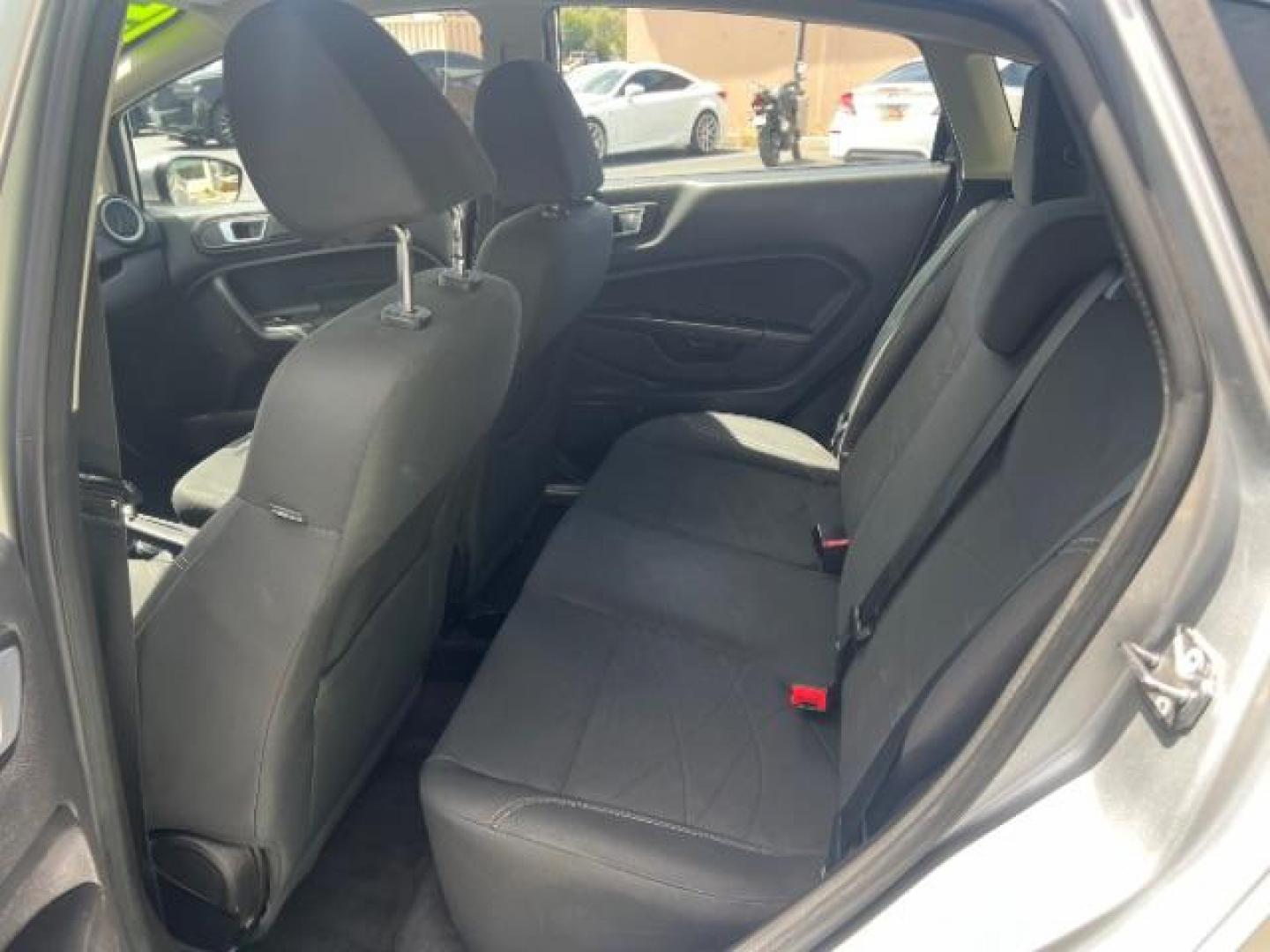 2015 Ingot Silver /Medium Light Stone Ford Fiesta SE (3FADP4EJ4FM) with an EcoBoost 1L I-3 gasoline direct injection engine, Automatic transmission, located at 940 North Main Street, Cedar City, UT, 84720, (435) 628-0023, 37.692936, -113.061897 - Versatile Southern Utah travel starts with this 2015 Ford Fiesta SE hatchback. Its 1.6L 4-cylinder engine, 6-speed automatic transmission, and front-wheel drive make it a smart fit for commuting, errands, and easy city parking. With 102817 miles, this Fiesta is ready for its next adventure. The SE- Photo#21