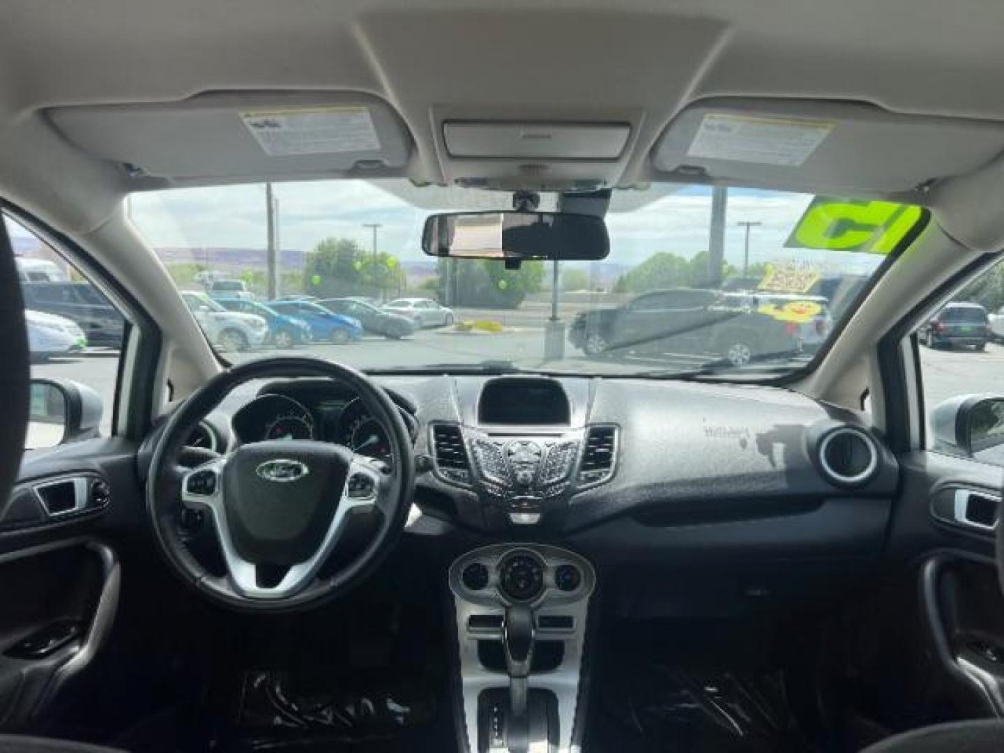 2015 Ingot Silver /Medium Light Stone Ford Fiesta SE (3FADP4EJ4FM) with an EcoBoost 1L I-3 gasoline direct injection engine, Automatic transmission, located at 940 North Main Street, Cedar City, UT, 84720, (435) 628-0023, 37.692936, -113.061897 - Versatile Southern Utah travel starts with this 2015 Ford Fiesta SE hatchback. Its 1.6L 4-cylinder engine, 6-speed automatic transmission, and front-wheel drive make it a smart fit for commuting, errands, and easy city parking. With 102817 miles, this Fiesta is ready for its next adventure. The SE- Photo#22