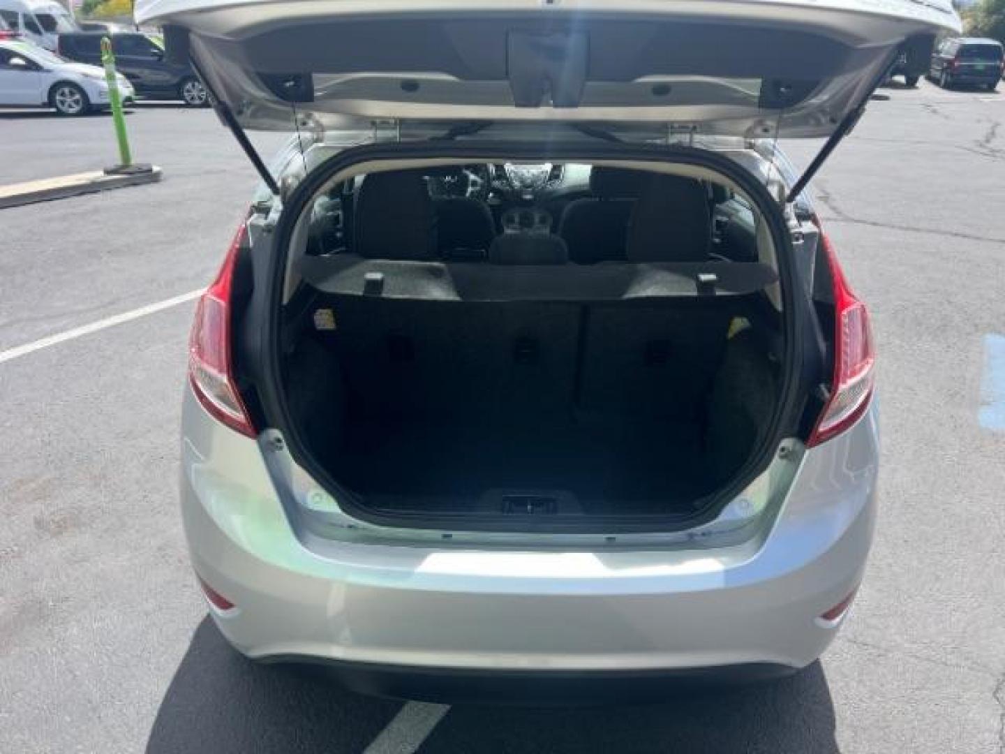 2015 Ingot Silver /Medium Light Stone Ford Fiesta SE (3FADP4EJ4FM) with an EcoBoost 1L I-3 gasoline direct injection engine, Automatic transmission, located at 940 North Main Street, Cedar City, UT, 84720, (435) 628-0023, 37.692936, -113.061897 - Versatile Southern Utah travel starts with this 2015 Ford Fiesta SE hatchback. Its 1.6L 4-cylinder engine, 6-speed automatic transmission, and front-wheel drive make it a smart fit for commuting, errands, and easy city parking. With 102817 miles, this Fiesta is ready for its next adventure. The SE- Photo#23