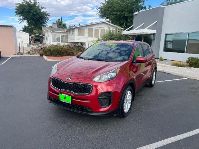 2017 Hyper Red /Black Kia Sportage LX (KNDPM3AC4H7) with an Theta II 2.4L I-4 gasoline direct injection engine, Automatic transmission, located at 1865 East Red Hills Pkwy, St. George, 84770, (435) 628-0023, 37.120850, -113.543640 - We specialize in helping ALL people get the best financing available. No matter your credit score, good, bad or none we can get you an amazing rate. Had a bankruptcy, divorce, or repossessions? We give you the green light to get your credit back on the road. Low down and affordable payments that fit - Photo#2