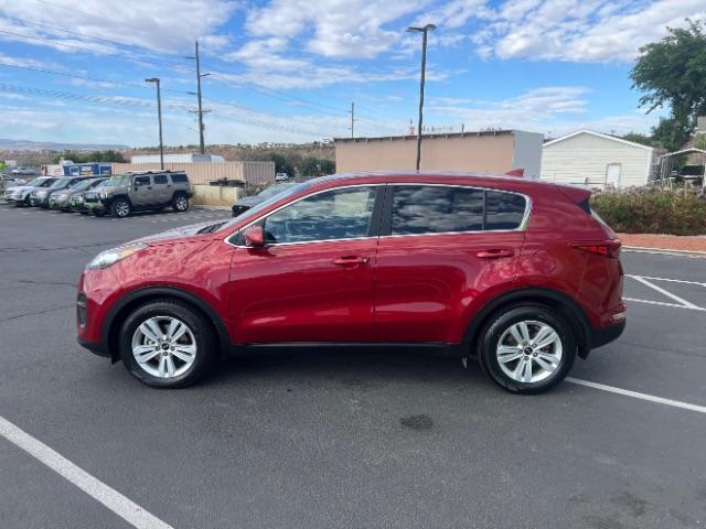 2017 Hyper Red /Black Kia Sportage LX (KNDPM3AC4H7) with an Theta II 2.4L I-4 gasoline direct injection engine, Automatic transmission, located at 1865 East Red Hills Pkwy, St. George, 84770, (435) 628-0023, 37.120850, -113.543640 - We specialize in helping ALL people get the best financing available. No matter your credit score, good, bad or none we can get you an amazing rate. Had a bankruptcy, divorce, or repossessions? We give you the green light to get your credit back on the road. Low down and affordable payments that fit - Photo#3