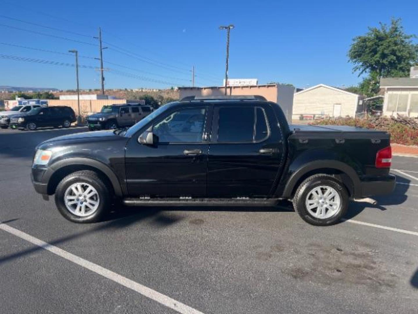 2010 Black /Black Ford Explorer Sport Trac XLT (1FMEU3BE3AU) with an 4L V-6 regular unleaded engine, Automatic transmission, located at 940 North Main Street, Cedar City, UT, 84720, (435) 628-0023, 37.692936, -113.061897 - We specialize in helping ALL people get the best financing available. No matter your credit score, good, bad or none we can get you an amazing rate. Had a bankruptcy, divorce, or repossessions? We give you the green light to get your credit back on the road. Low down and affordable payments that fit- Photo#3