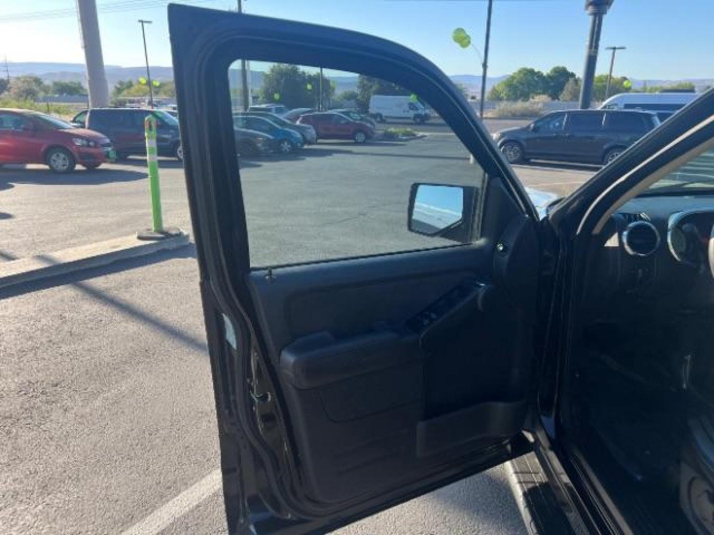2010 Black /Black Ford Explorer Sport Trac XLT (1FMEU3BE3AU) with an 4L V-6 regular unleaded engine, Automatic transmission, located at 940 North Main Street, Cedar City, UT, 84720, (435) 628-0023, 37.692936, -113.061897 - We specialize in helping ALL people get the best financing available. No matter your credit score, good, bad or none we can get you an amazing rate. Had a bankruptcy, divorce, or repossessions? We give you the green light to get your credit back on the road. Low down and affordable payments that fit- Photo#12
