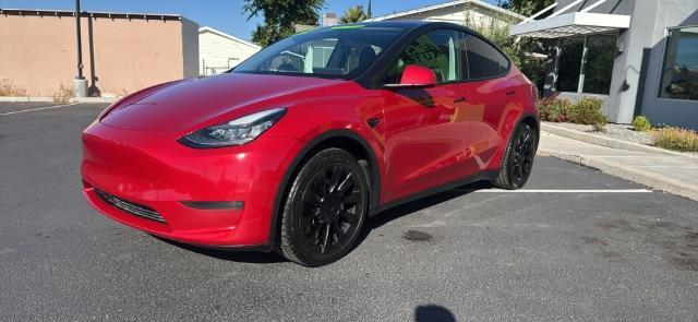 2020 Red Multi-Coat /Black Tesla Model Y Long Range Dual Motor All-Wheel Drive (5YJYGDEE0LF) , located at 1865 East Red Hills Pkwy, St. George, 84770, (435) 628-0023, 37.120850, -113.543640 - Excellent low miles Tesla Model Y Long Range, All Wheel Drive with ACCELERATION BOOST paid for ($2k upgrade) Fully transfer to the new owner. 5 Seats. It has HW3. Inside and outside in great shape. Tires are good but rims have some repaired curbrash. Dash wood trim has been painted, see pics. All - Photo#2