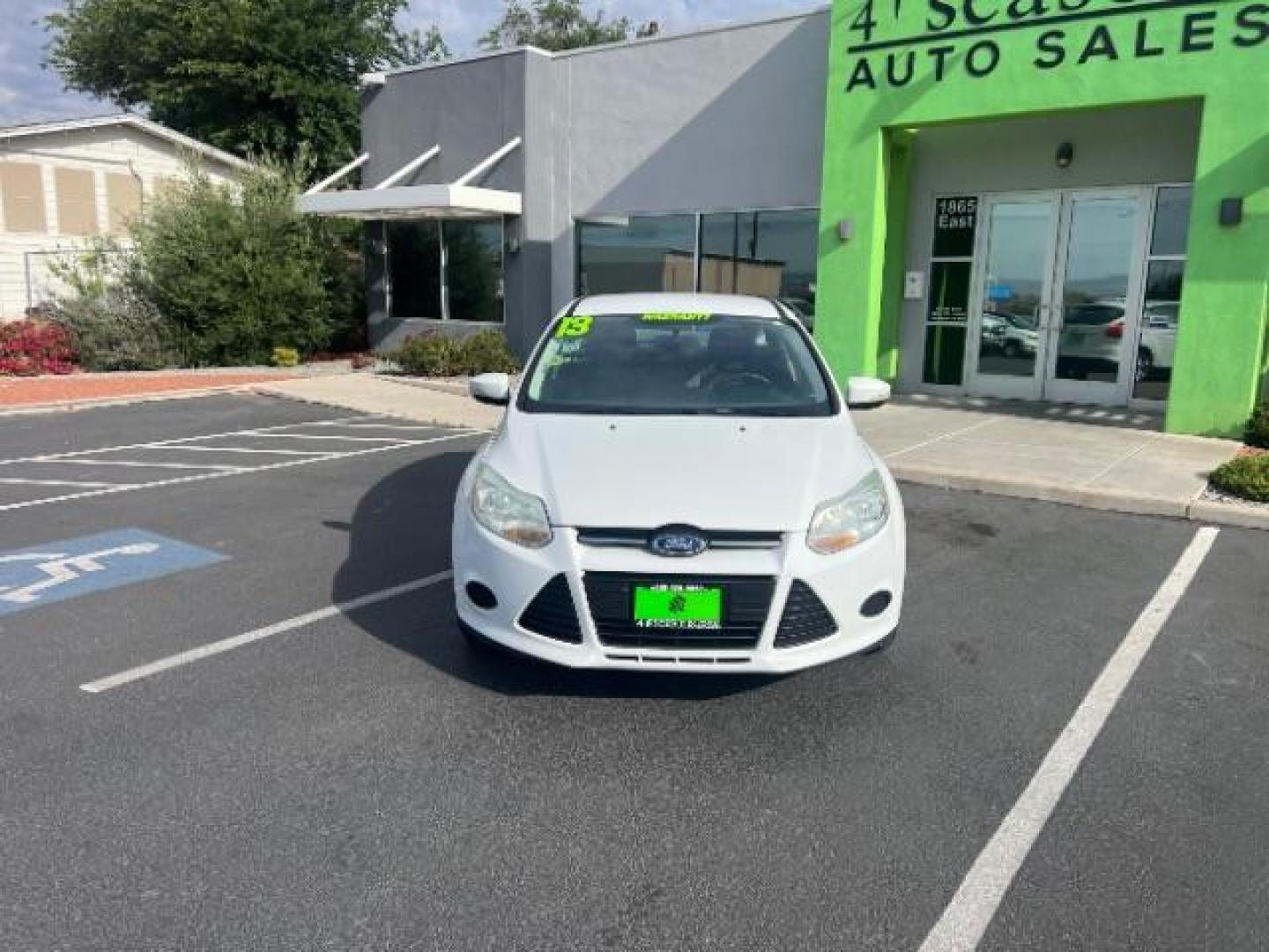 2013 Oxford White /Charcoal Black w/Warm Steel Surround Ford Focus SE (1FADP3K20DL) with an 2L I-4 gasoline direct injection engine, Automatic transmission, located at 940 North Main Street, Cedar City, UT, 84720, (435) 628-0023, 37.692936, -113.061897 - We specialize in helping ALL people get the best financing available. No matter your credit score, good, bad or none we can get you an amazing rate. Had a bankruptcy, divorce, or repossessions? We give you the green light to get your credit back on the road. Low down and affordable payments that fit- Photo#1