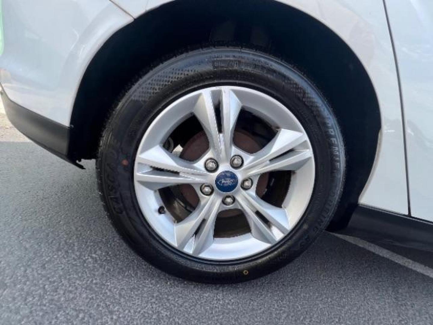2013 Oxford White /Charcoal Black w/Warm Steel Surround Ford Focus SE (1FADP3K20DL) with an 2L I-4 gasoline direct injection engine, Automatic transmission, located at 940 North Main Street, Cedar City, UT, 84720, (435) 628-0023, 37.692936, -113.061897 - We specialize in helping ALL people get the best financing available. No matter your credit score, good, bad or none we can get you an amazing rate. Had a bankruptcy, divorce, or repossessions? We give you the green light to get your credit back on the road. Low down and affordable payments that fit- Photo#11