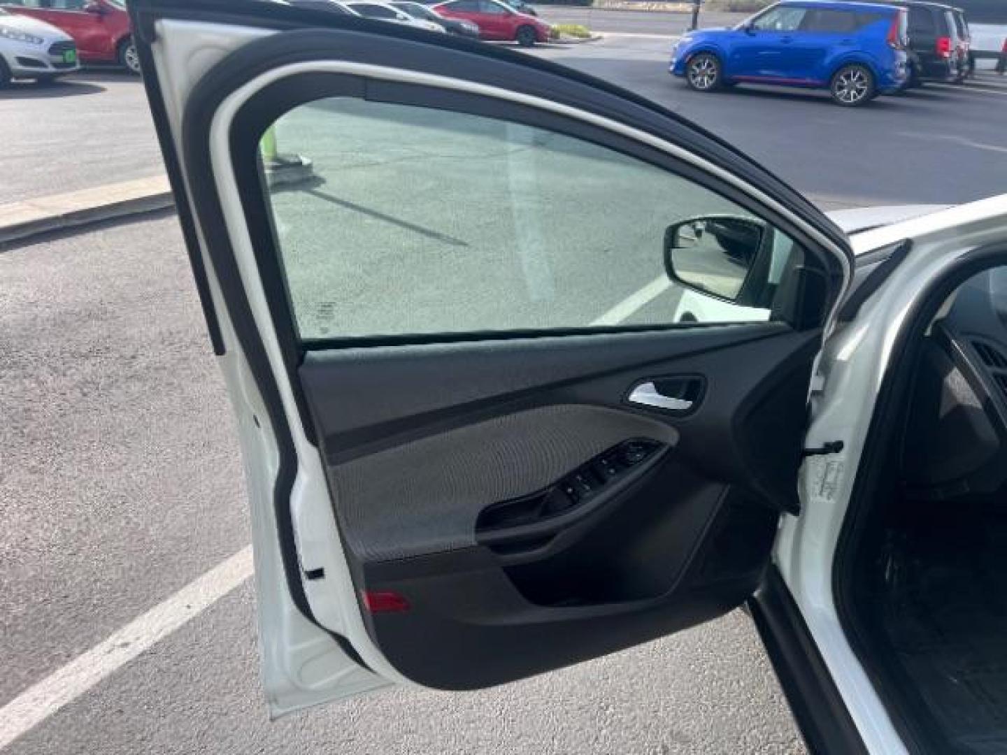 2013 Oxford White /Charcoal Black w/Warm Steel Surround Ford Focus SE (1FADP3K20DL) with an 2L I-4 gasoline direct injection engine, Automatic transmission, located at 940 North Main Street, Cedar City, UT, 84720, (435) 628-0023, 37.692936, -113.061897 - We specialize in helping ALL people get the best financing available. No matter your credit score, good, bad or none we can get you an amazing rate. Had a bankruptcy, divorce, or repossessions? We give you the green light to get your credit back on the road. Low down and affordable payments that fit- Photo#12