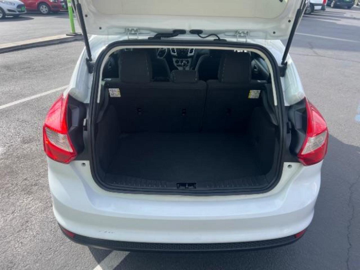 2013 Oxford White /Charcoal Black w/Warm Steel Surround Ford Focus SE (1FADP3K20DL) with an 2L I-4 gasoline direct injection engine, Automatic transmission, located at 940 North Main Street, Cedar City, UT, 84720, (435) 628-0023, 37.692936, -113.061897 - We specialize in helping ALL people get the best financing available. No matter your credit score, good, bad or none we can get you an amazing rate. Had a bankruptcy, divorce, or repossessions? We give you the green light to get your credit back on the road. Low down and affordable payments that fit- Photo#23