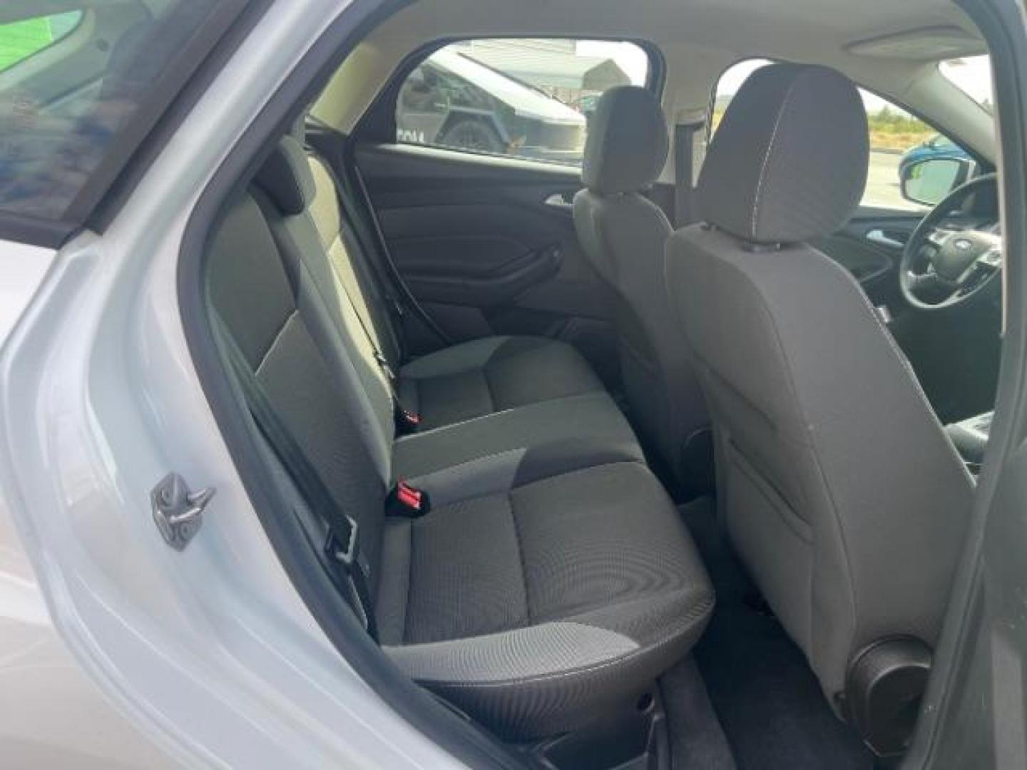2013 Oxford White /Charcoal Black w/Warm Steel Surround Ford Focus SE (1FADP3K20DL) with an 2L I-4 gasoline direct injection engine, Automatic transmission, located at 940 North Main Street, Cedar City, UT, 84720, (435) 628-0023, 37.692936, -113.061897 - We specialize in helping ALL people get the best financing available. No matter your credit score, good, bad or none we can get you an amazing rate. Had a bankruptcy, divorce, or repossessions? We give you the green light to get your credit back on the road. Low down and affordable payments that fit- Photo#25