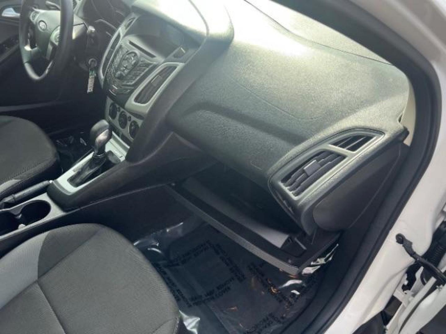 2013 Oxford White /Charcoal Black w/Warm Steel Surround Ford Focus SE (1FADP3K20DL) with an 2L I-4 gasoline direct injection engine, Automatic transmission, located at 940 North Main Street, Cedar City, UT, 84720, (435) 628-0023, 37.692936, -113.061897 - We specialize in helping ALL people get the best financing available. No matter your credit score, good, bad or none we can get you an amazing rate. Had a bankruptcy, divorce, or repossessions? We give you the green light to get your credit back on the road. Low down and affordable payments that fit- Photo#28