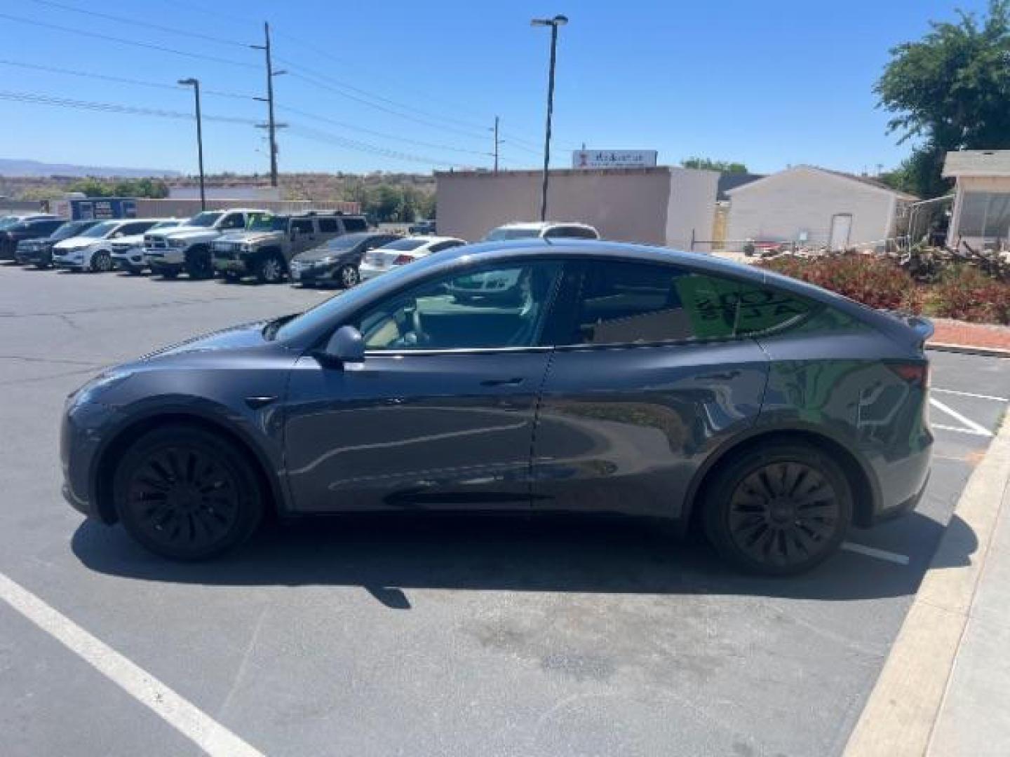 2021 Midnight Silver Metallic /Black Tesla Model Y Long Range Dual Motor All-Wheel Drive (5YJYGDEE4MF) with an ELECTRIC engine, Electric transmission, located at 1865 East Red Hills Pkwy, St. George, 84770, (435) 628-0023, 37.120850, -113.543640 - Excellent Tesla Model Y Long Range All Wheel Drive. HW3. Inside and outside in great shape. Tires are good. All our Teslas come with charging kit. Battery is healthy. Gets 285 on full charge. Recurrent Battery Health Report 95% 1 Owner, Clean title, no accidents Still has remaining 120k mile T- Photo#5