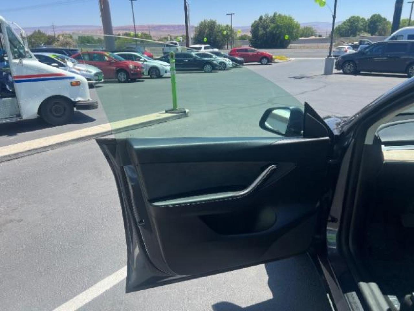 2021 Midnight Silver Metallic /Black Tesla Model Y Long Range Dual Motor All-Wheel Drive (5YJYGDEE4MF) with an ELECTRIC engine, Electric transmission, located at 1865 East Red Hills Pkwy, St. George, 84770, (435) 628-0023, 37.120850, -113.543640 - Excellent Tesla Model Y Long Range All Wheel Drive. HW3. Inside and outside in great shape. Tires are good. All our Teslas come with charging kit. Battery is healthy. Gets 285 on full charge. Recurrent Battery Health Report 95% 1 Owner, Clean title, no accidents Still has remaining 120k mile T- Photo#14