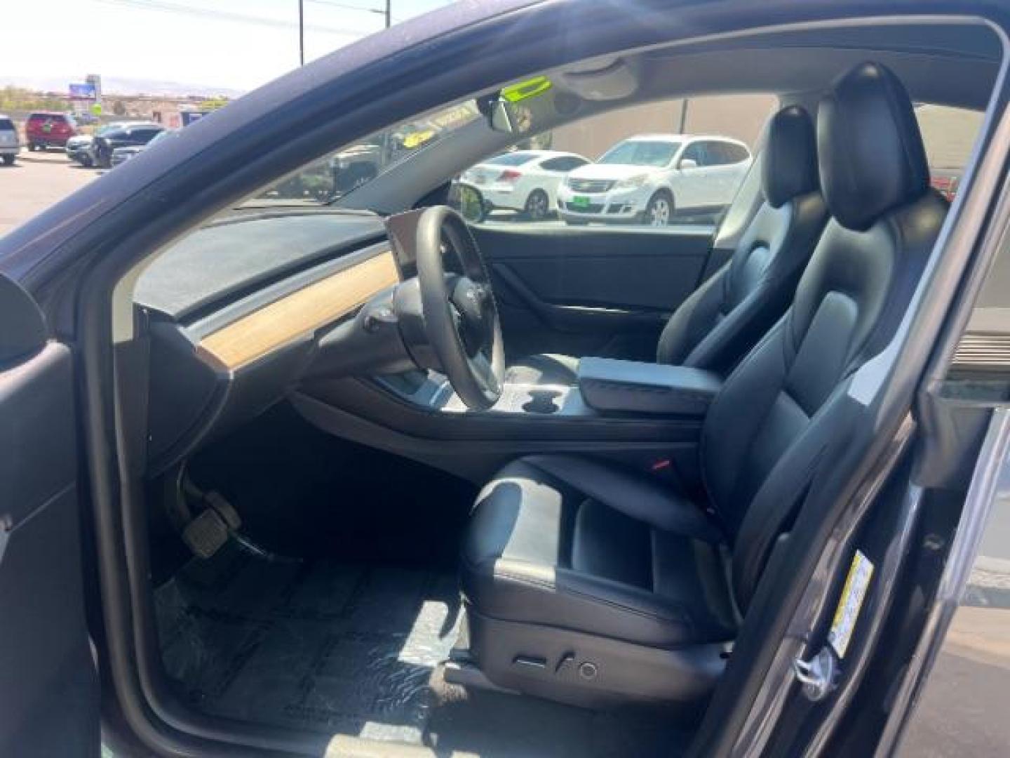 2021 Midnight Silver Metallic /Black Tesla Model Y Long Range Dual Motor All-Wheel Drive (5YJYGDEE4MF) with an ELECTRIC engine, Electric transmission, located at 1865 East Red Hills Pkwy, St. George, 84770, (435) 628-0023, 37.120850, -113.543640 - Excellent Tesla Model Y Long Range All Wheel Drive. HW3. Inside and outside in great shape. Tires are good. All our Teslas come with charging kit. Battery is healthy. Gets 285 on full charge. Recurrent Battery Health Report 95% 1 Owner, Clean title, no accidents Still has remaining 120k mile T- Photo#16