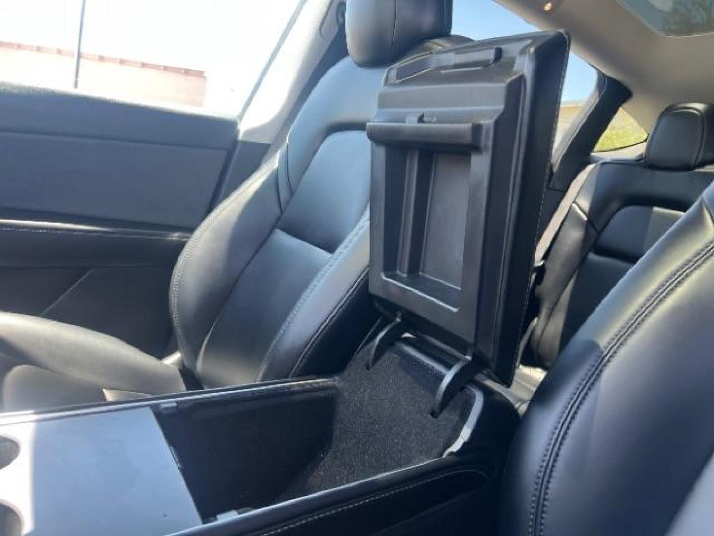 2021 Midnight Silver Metallic /Black Tesla Model Y Long Range Dual Motor All-Wheel Drive (5YJYGDEE4MF) with an ELECTRIC engine, Electric transmission, located at 1865 East Red Hills Pkwy, St. George, 84770, (435) 628-0023, 37.120850, -113.543640 - Excellent Tesla Model Y Long Range All Wheel Drive. HW3. Inside and outside in great shape. Tires are good. All our Teslas come with charging kit. Battery is healthy. Gets 285 on full charge. Recurrent Battery Health Report 95% 1 Owner, Clean title, no accidents Still has remaining 120k mile T- Photo#19