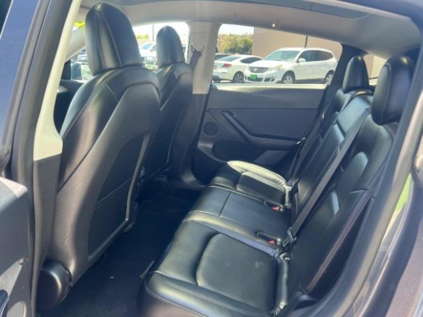 2021 Midnight Silver Metallic /Black Tesla Model Y Long Range Dual Motor All-Wheel Drive (5YJYGDEE4MF) with an ELECTRIC engine, Electric transmission, located at 1865 East Red Hills Pkwy, St. George, 84770, (435) 628-0023, 37.120850, -113.543640 - Excellent Tesla Model Y Long Range All Wheel Drive. HW3. Inside and outside in great shape. Tires are good. All our Teslas come with charging kit. Battery is healthy. Gets 285 on full charge. Recurrent Battery Health Report 95% 1 Owner, Clean title, no accidents Still has remaining 120k mile T- Photo#21