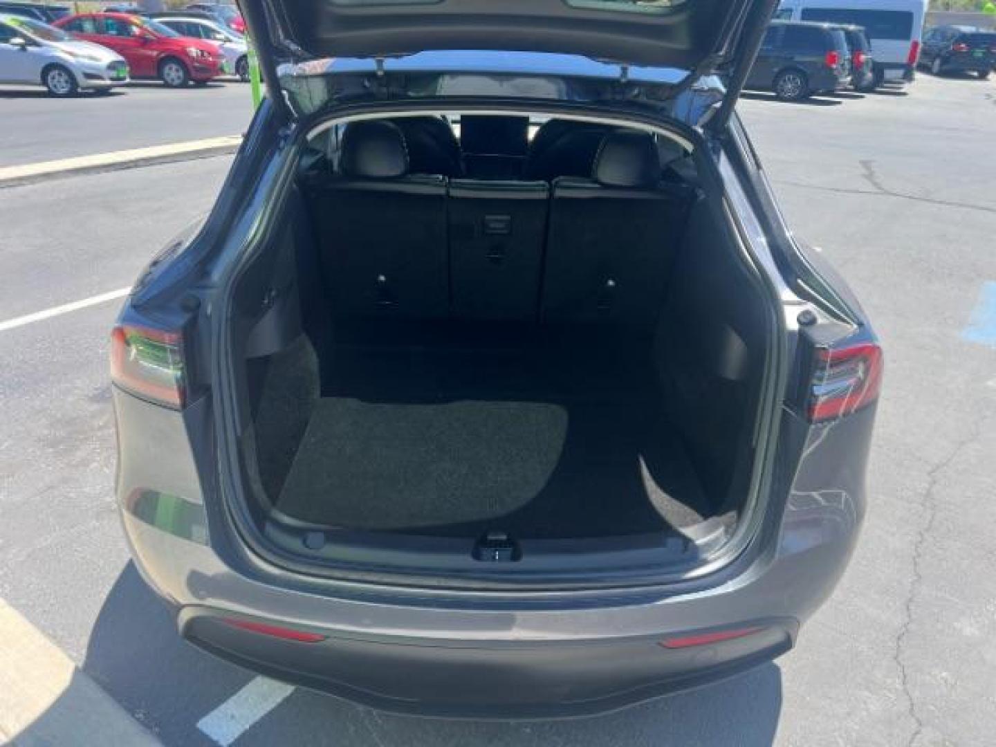 2021 Midnight Silver Metallic /Black Tesla Model Y Long Range Dual Motor All-Wheel Drive (5YJYGDEE4MF) with an ELECTRIC engine, Electric transmission, located at 1865 East Red Hills Pkwy, St. George, 84770, (435) 628-0023, 37.120850, -113.543640 - Excellent Tesla Model Y Long Range All Wheel Drive. HW3. Inside and outside in great shape. Tires are good. All our Teslas come with charging kit. Battery is healthy. Gets 285 on full charge. Recurrent Battery Health Report 95% 1 Owner, Clean title, no accidents Still has remaining 120k mile T- Photo#24