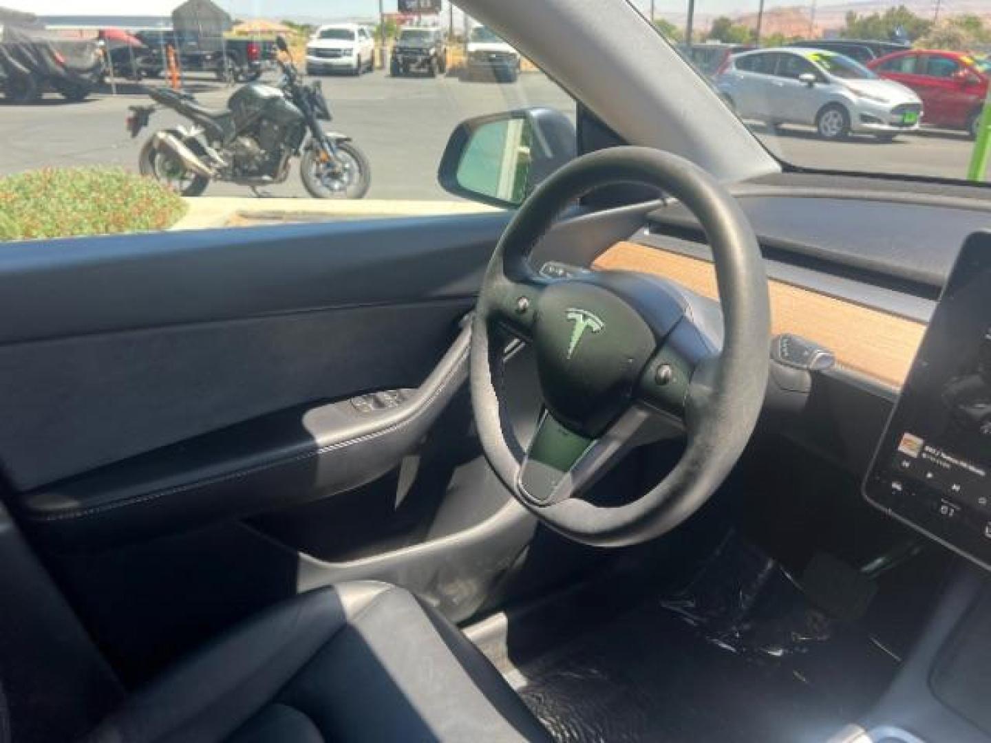 2021 Midnight Silver Metallic /Black Tesla Model Y Long Range Dual Motor All-Wheel Drive (5YJYGDEE4MF) with an ELECTRIC engine, Electric transmission, located at 1865 East Red Hills Pkwy, St. George, 84770, (435) 628-0023, 37.120850, -113.543640 - Excellent Tesla Model Y Long Range All Wheel Drive. HW3. Inside and outside in great shape. Tires are good. All our Teslas come with charging kit. Battery is healthy. Gets 285 on full charge. Recurrent Battery Health Report 95% 1 Owner, Clean title, no accidents Still has remaining 120k mile T- Photo#29